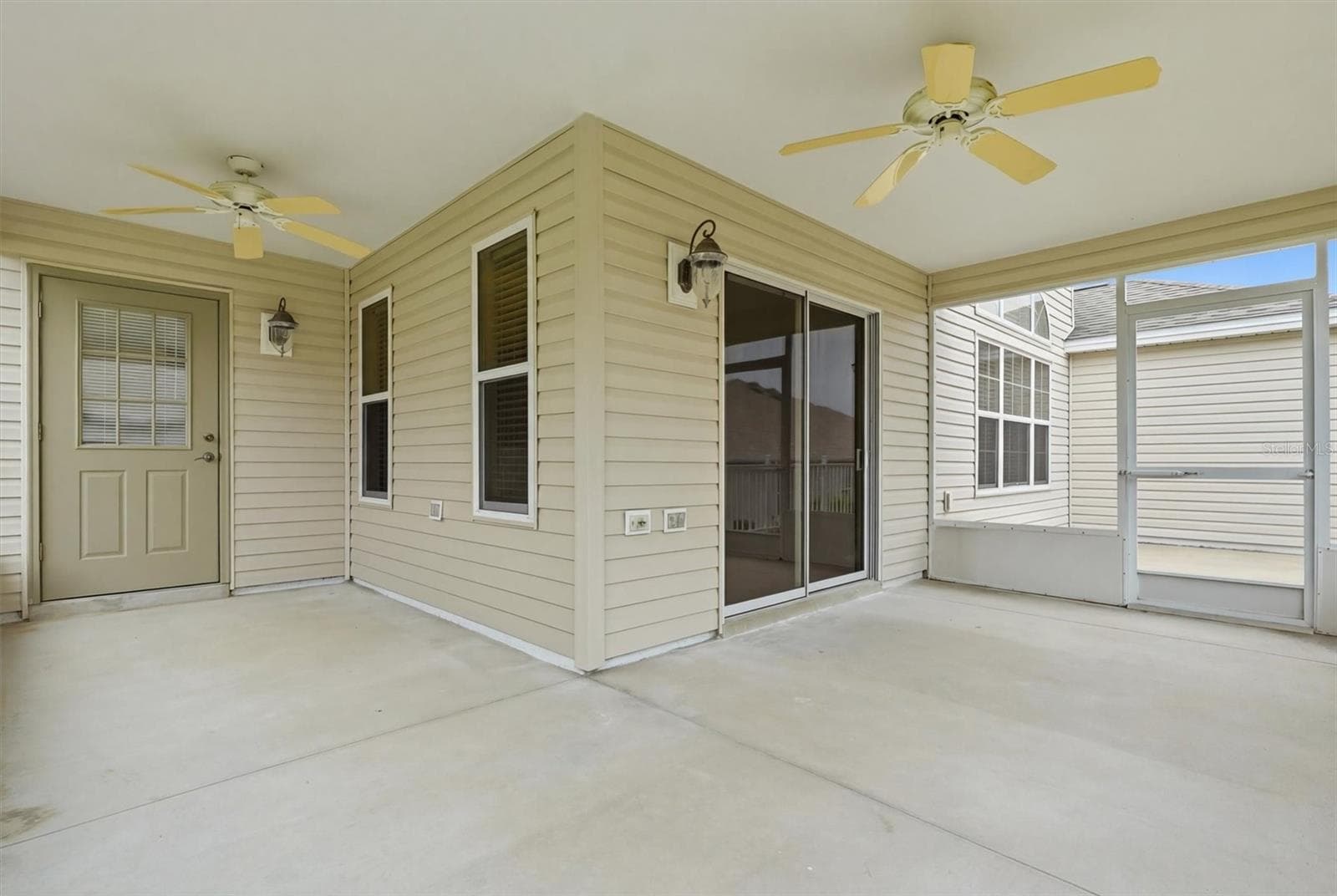 Screened in Lanai with Ceiling Fans. Sliding doors into Dining Room. - 1563 EASTOVER TER, THE VILLAGES