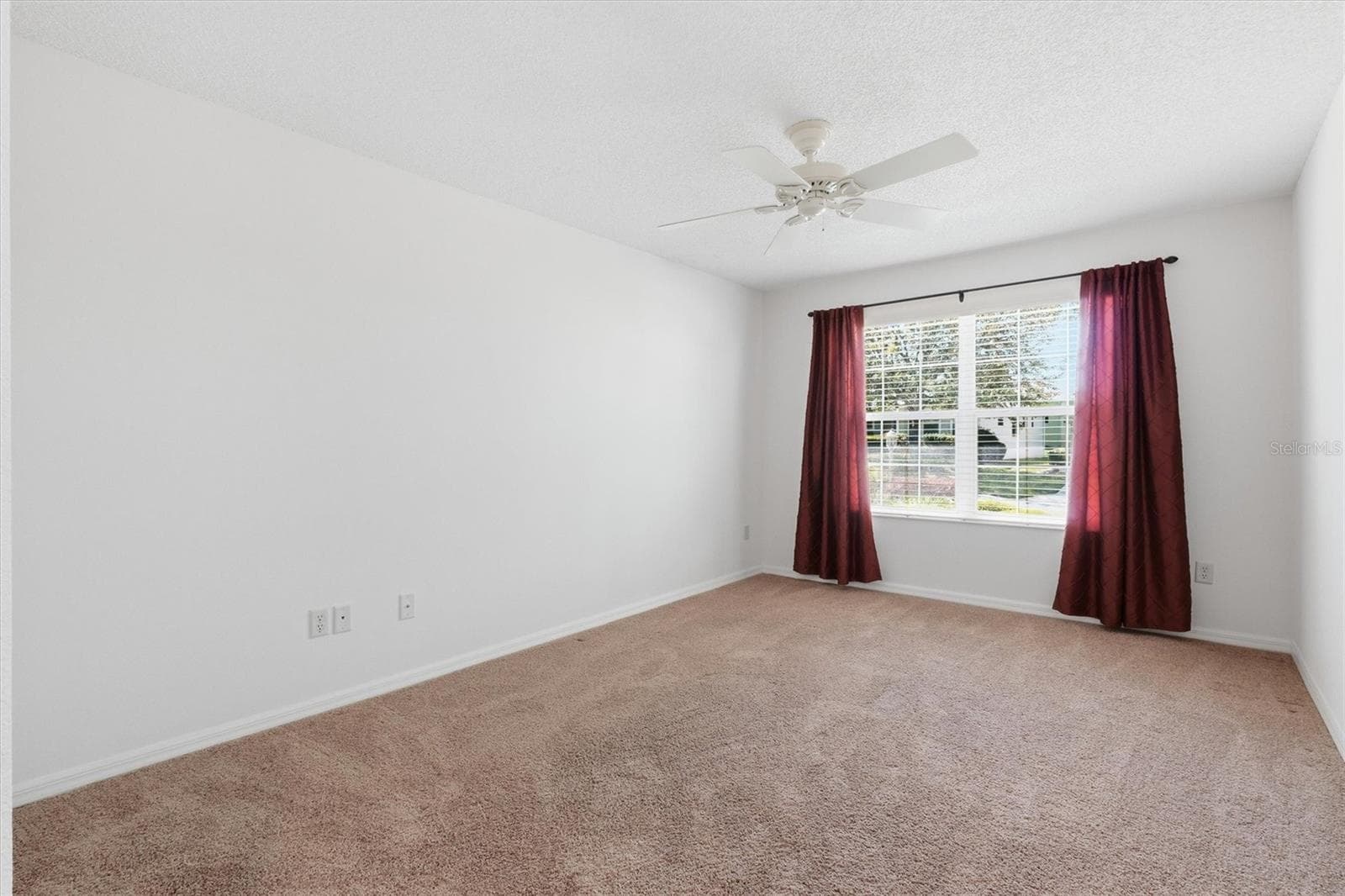 Bedroom #3 Guest bedroom, carpet and ceiling fan. - 1563 EASTOVER TER, THE VILLAGES