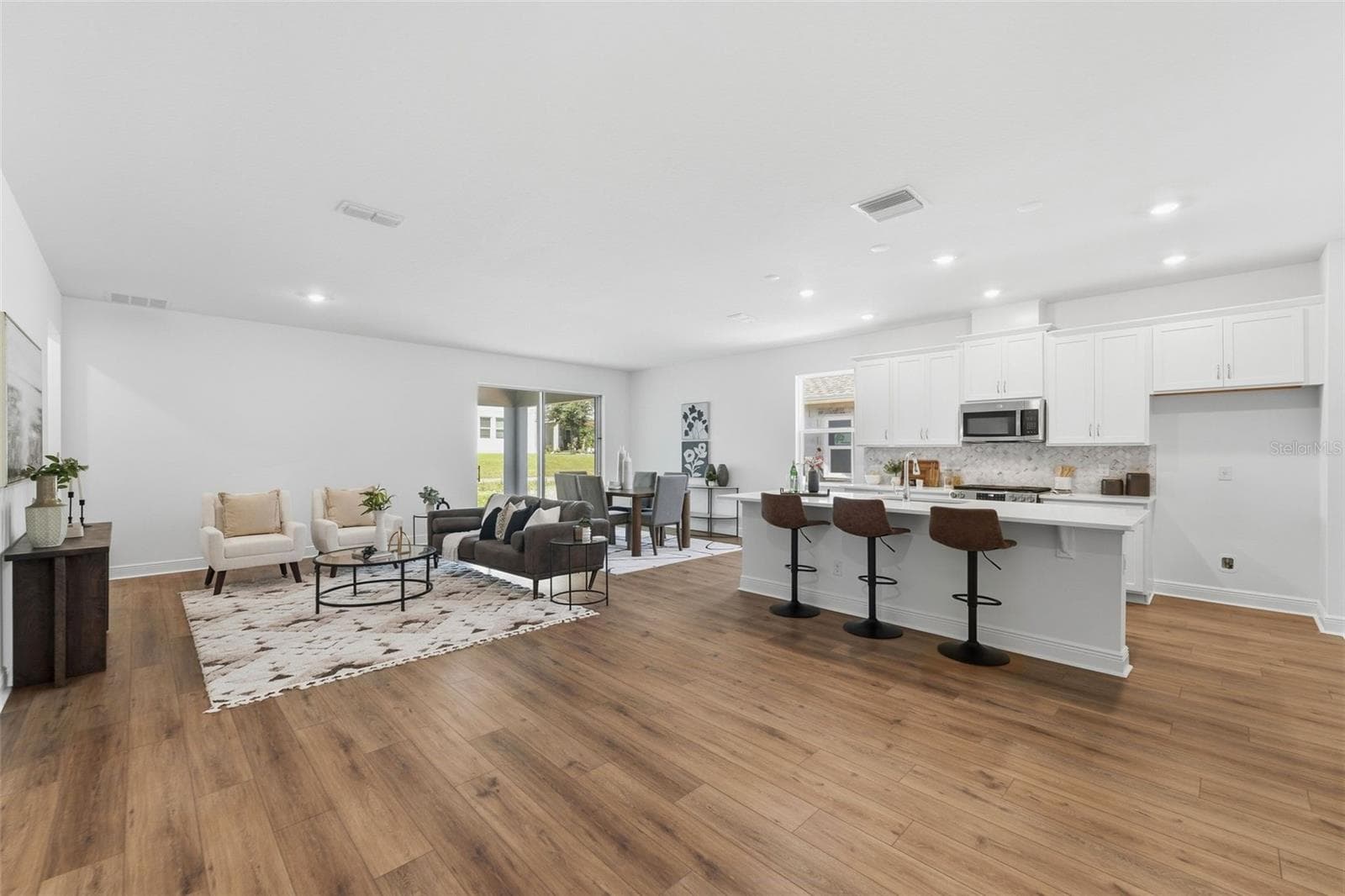 Kitchen & Great Room - 436 LEMONGRASS RD, MINNEOLA