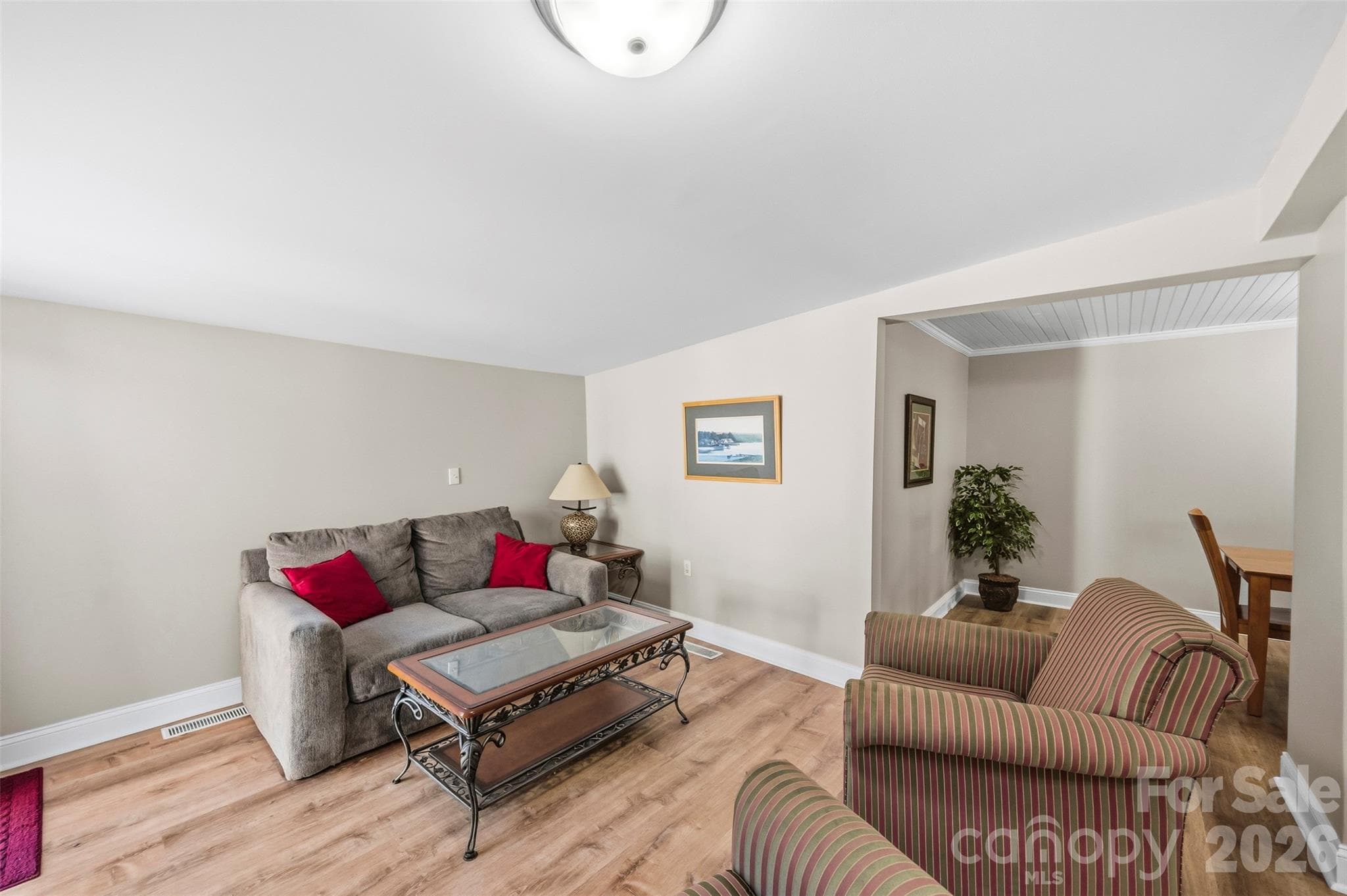 Family room (12'11" x 11'6") off the kitchen. - 220 Armour Street, Davidson