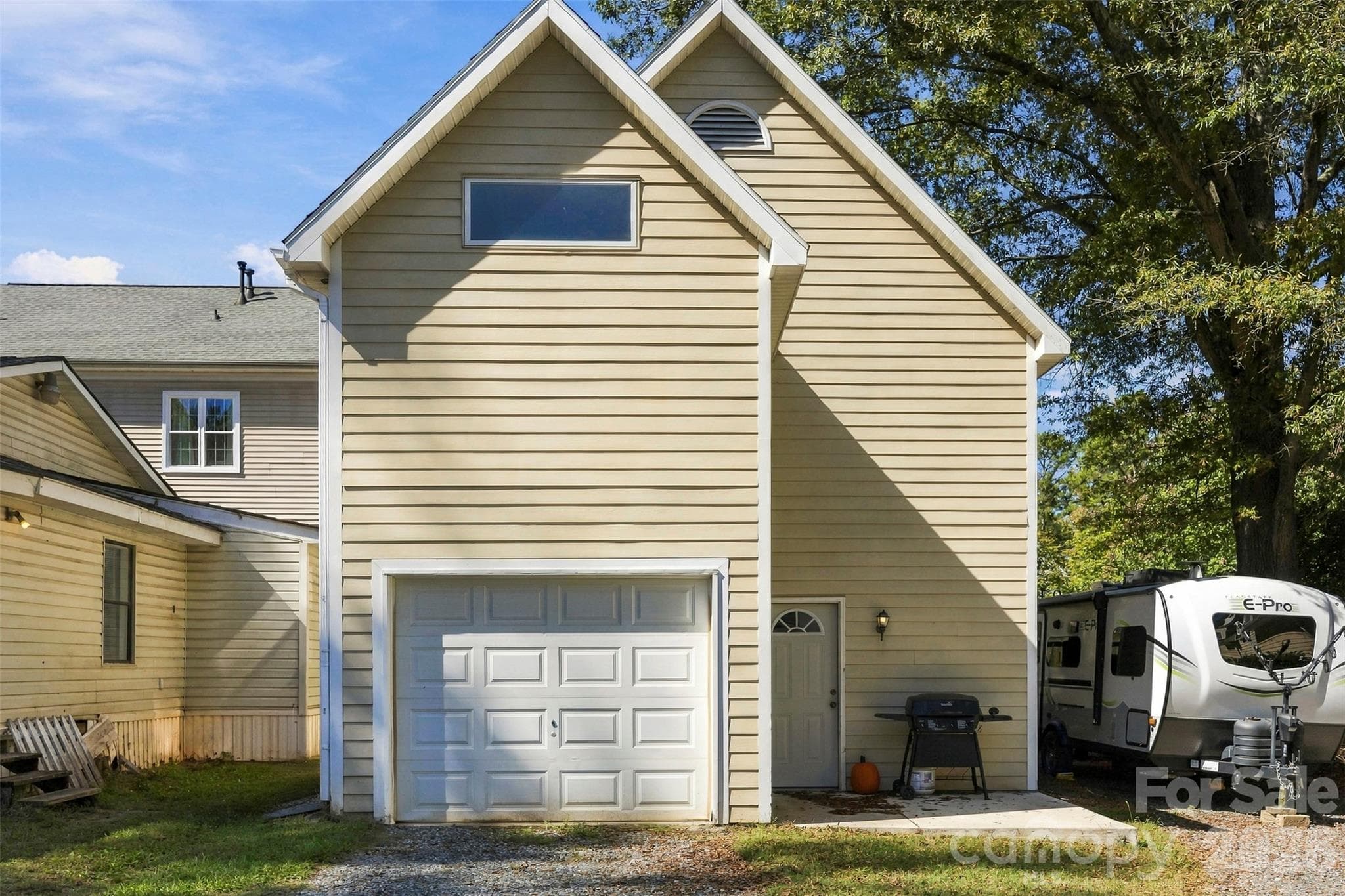 Unit B: two-story accessory unit with an attached garage. - 220 Armour Street, Davidson