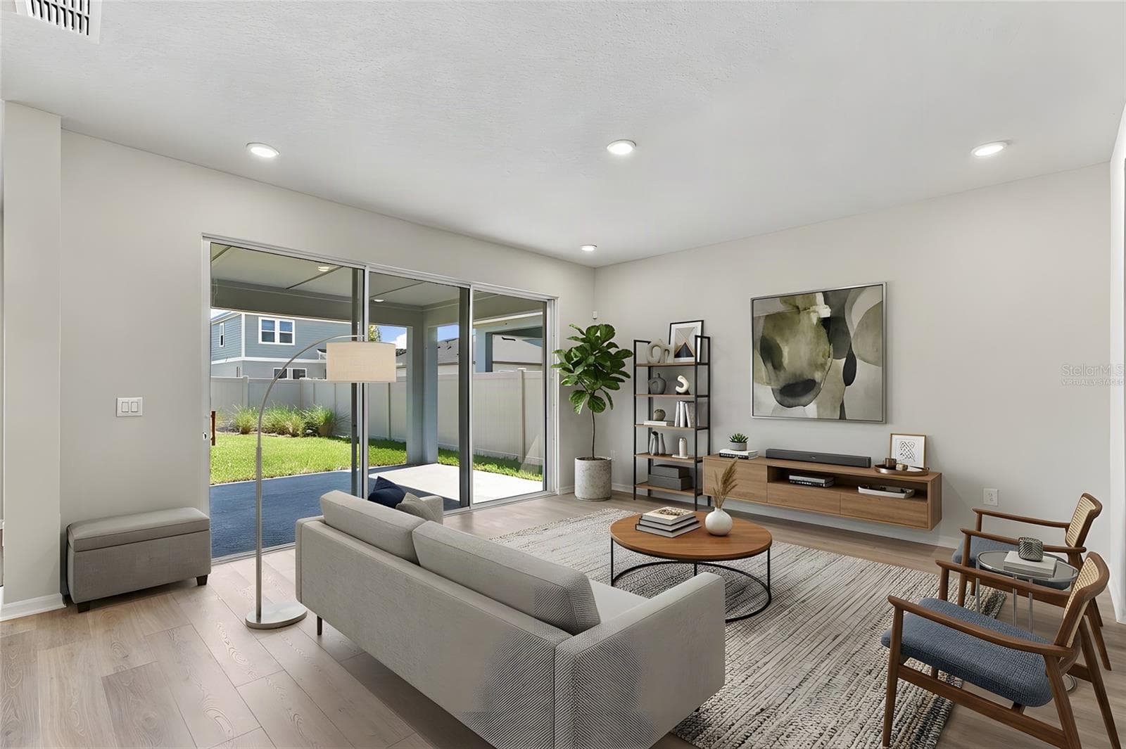 Family Room **Virtually Staged - 5831 NATIVE OAK ST, MOUNT DORA