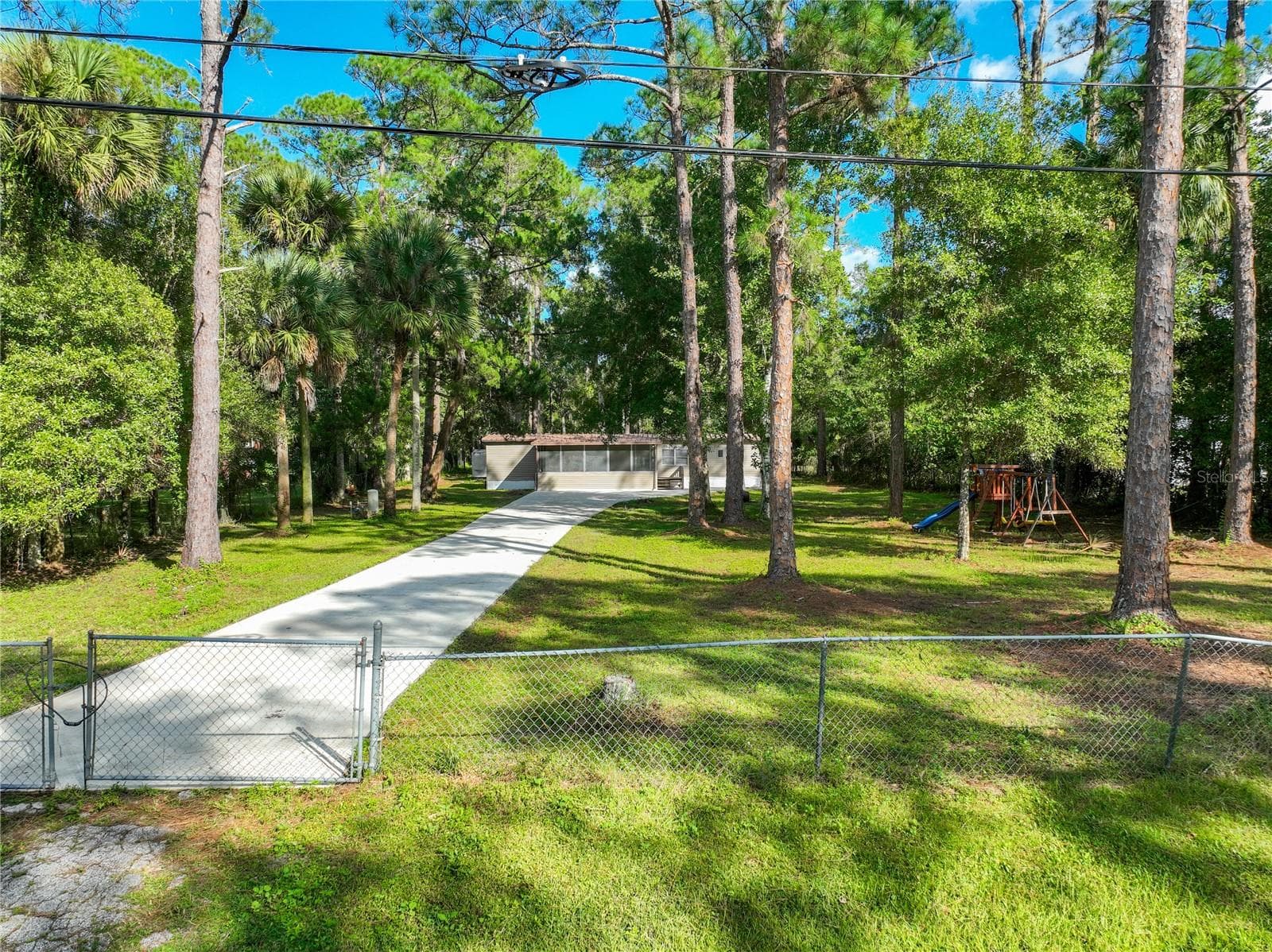 Manufactured Home at 1205 CUPID AVE, CHRISTMAS, photo 6 of 82