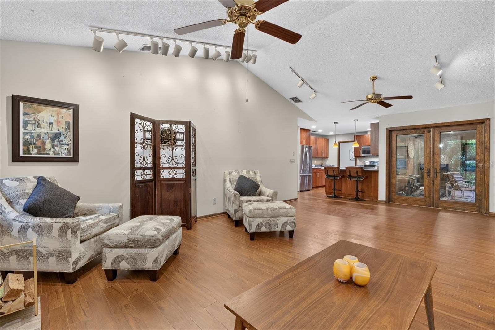 Living Room looking into kitchen - 3300 MEADOW VIEW LN, PALM HARBOR