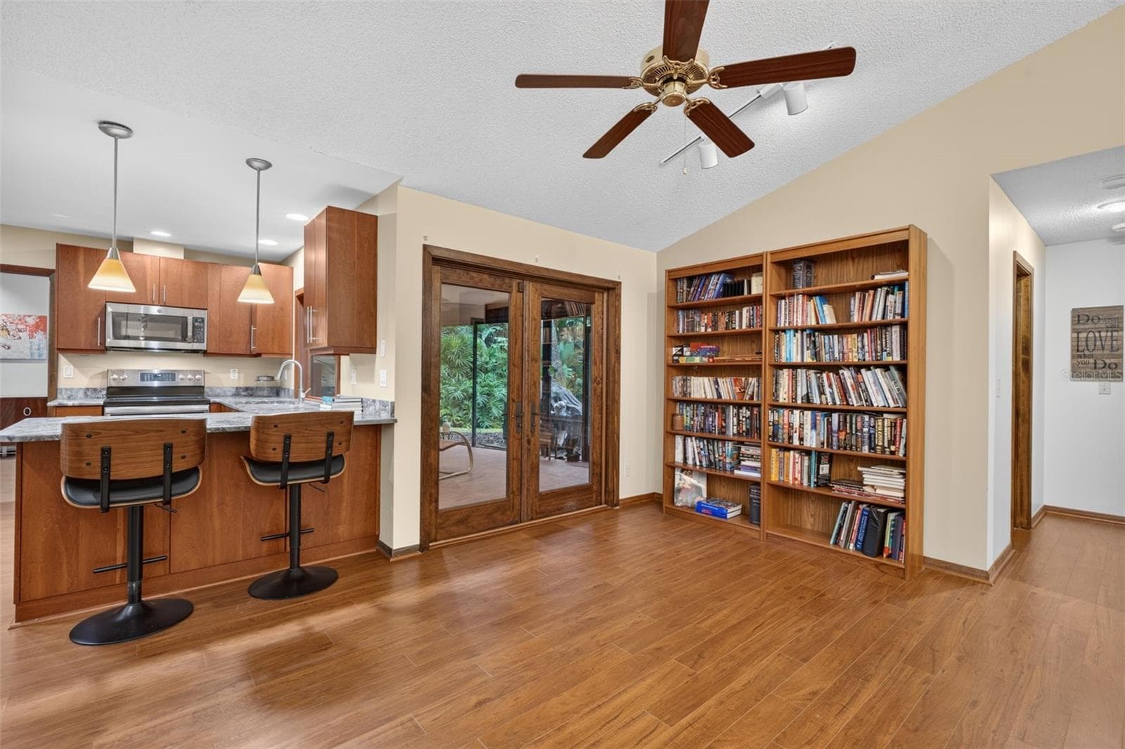 Doors to screened patio - 3300 MEADOW VIEW LN, PALM HARBOR