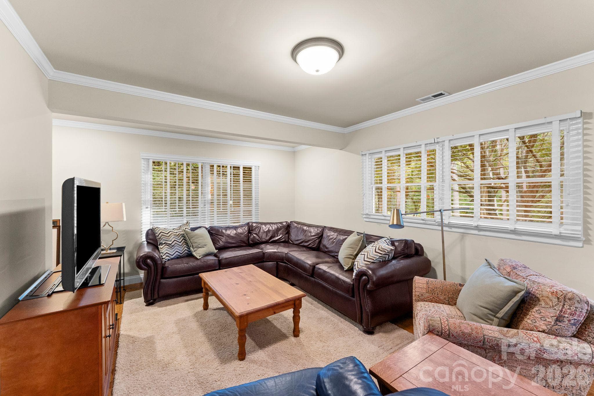Media room or flex space in the Bonus Room area on the main level - 2006 Grey Road, Davidson