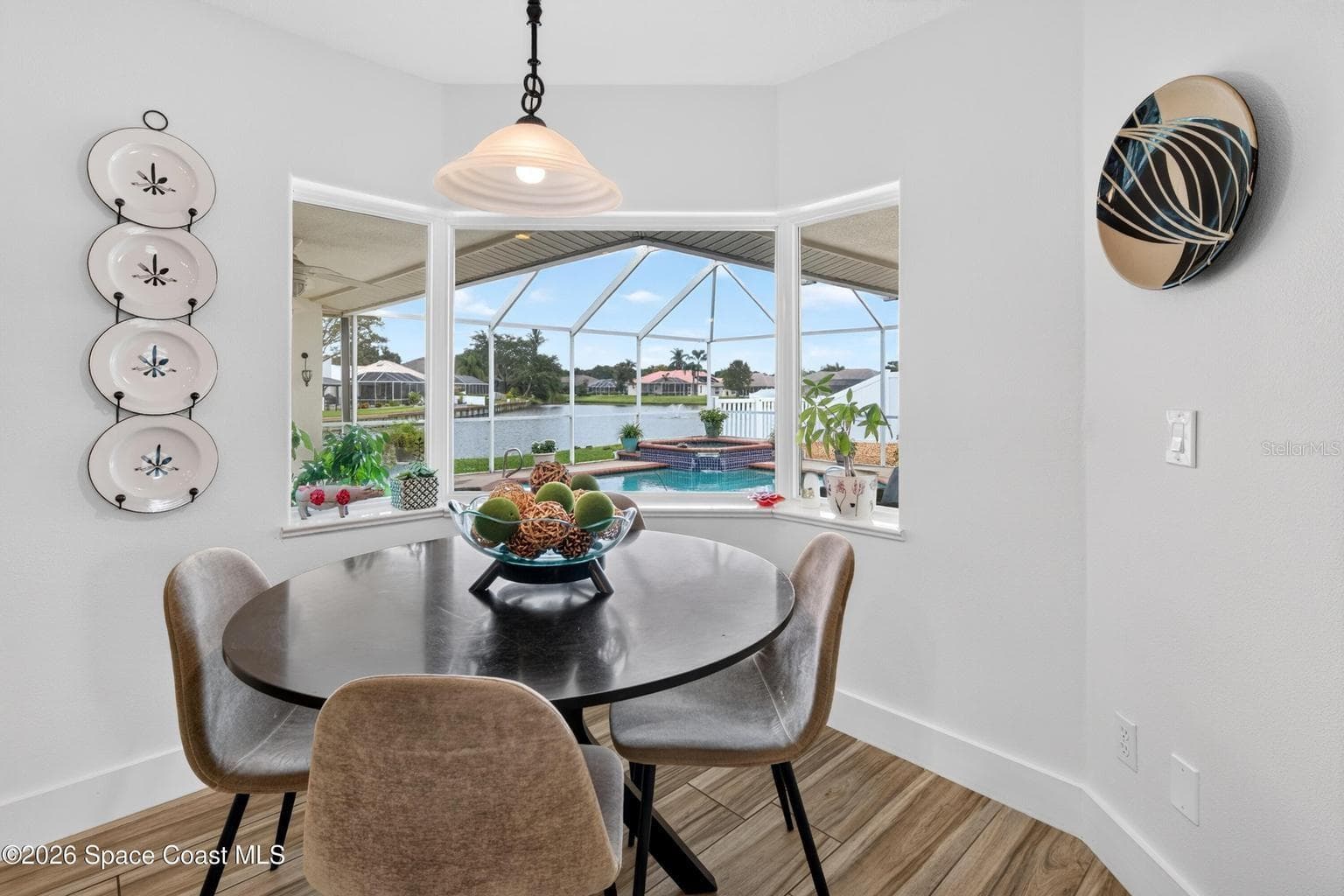 Bay window nook, pool and lake views - 3726 SUNWARD DR, MERRITT ISLAND