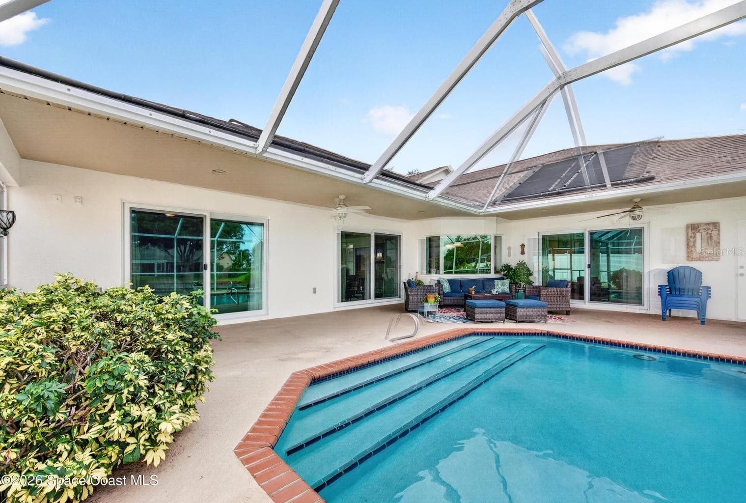 Covered lanai and screened pool - 3726 SUNWARD DR, MERRITT ISLAND