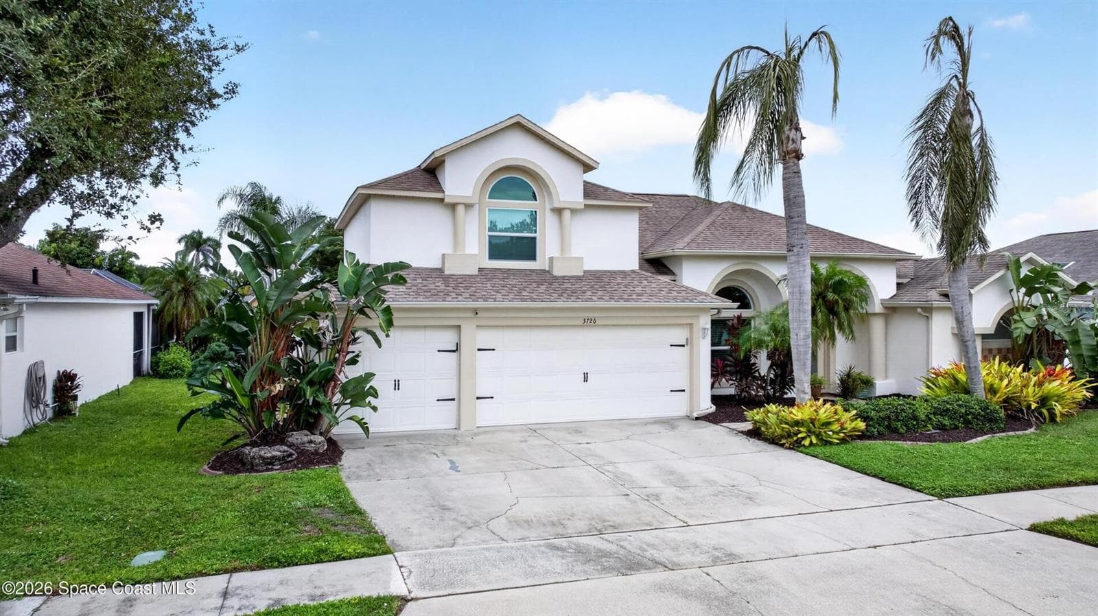 Aerial view of home and lake - 3726 SUNWARD DR, MERRITT ISLAND