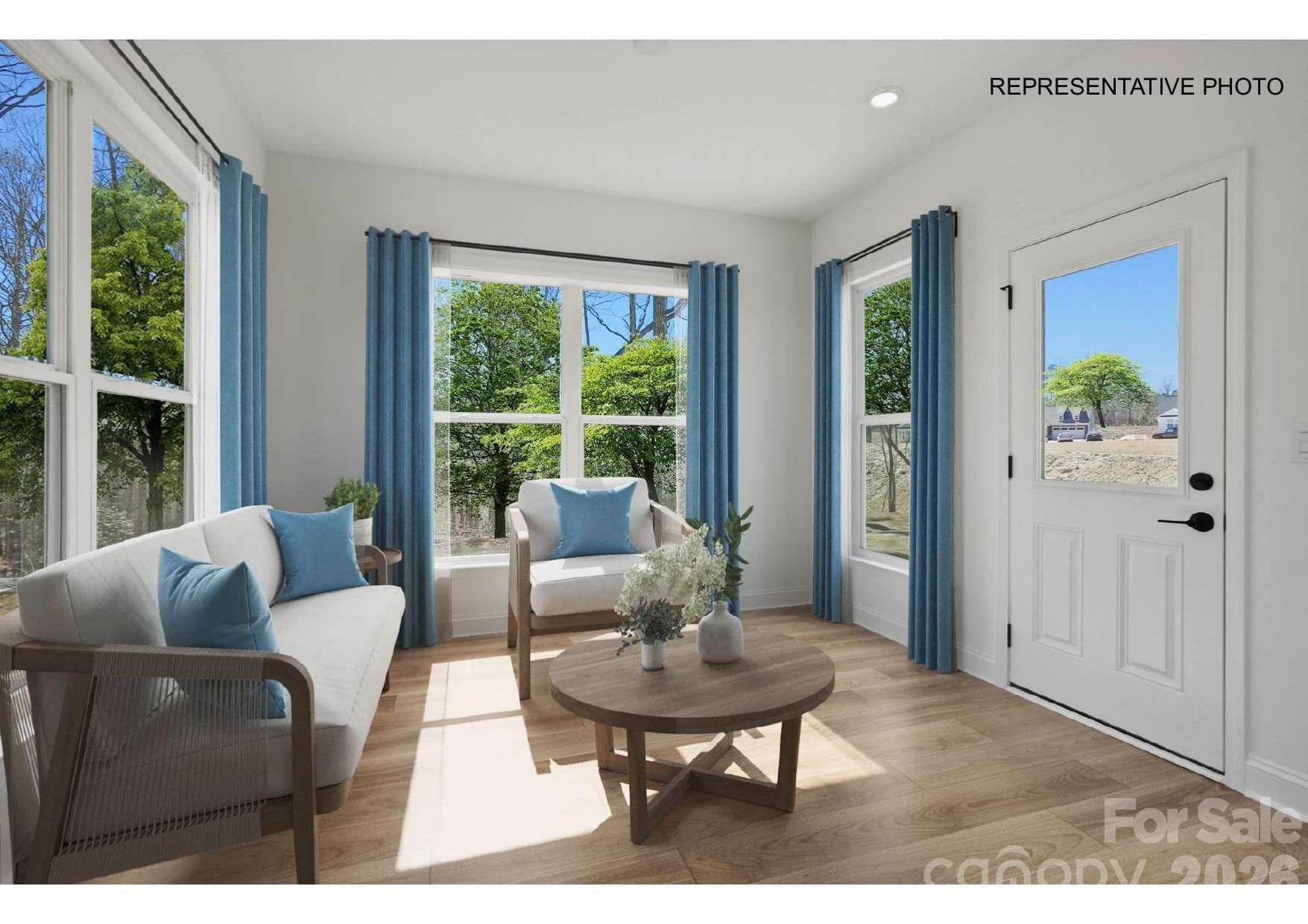 And airy sunroom! - 7689 Pedigree Circle, Lancaster