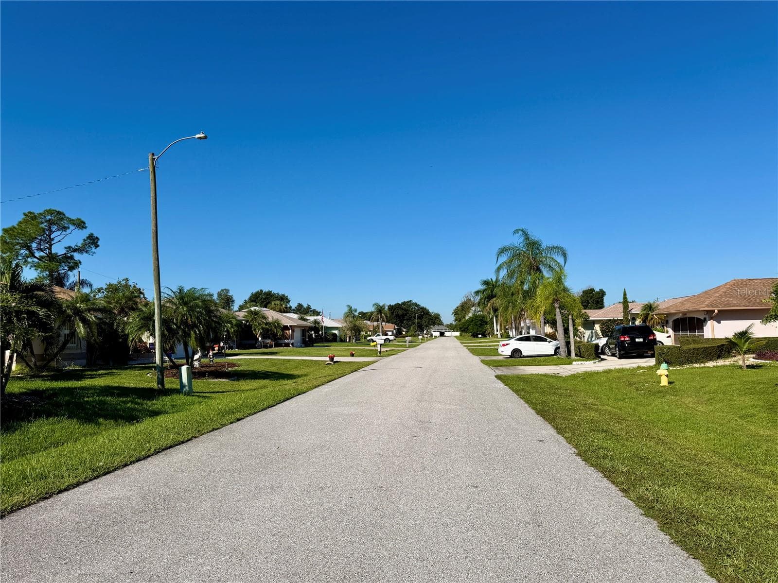Looking West on Mullins Ave - 23411 MULLINS AVE, PORT CHARLOTTE