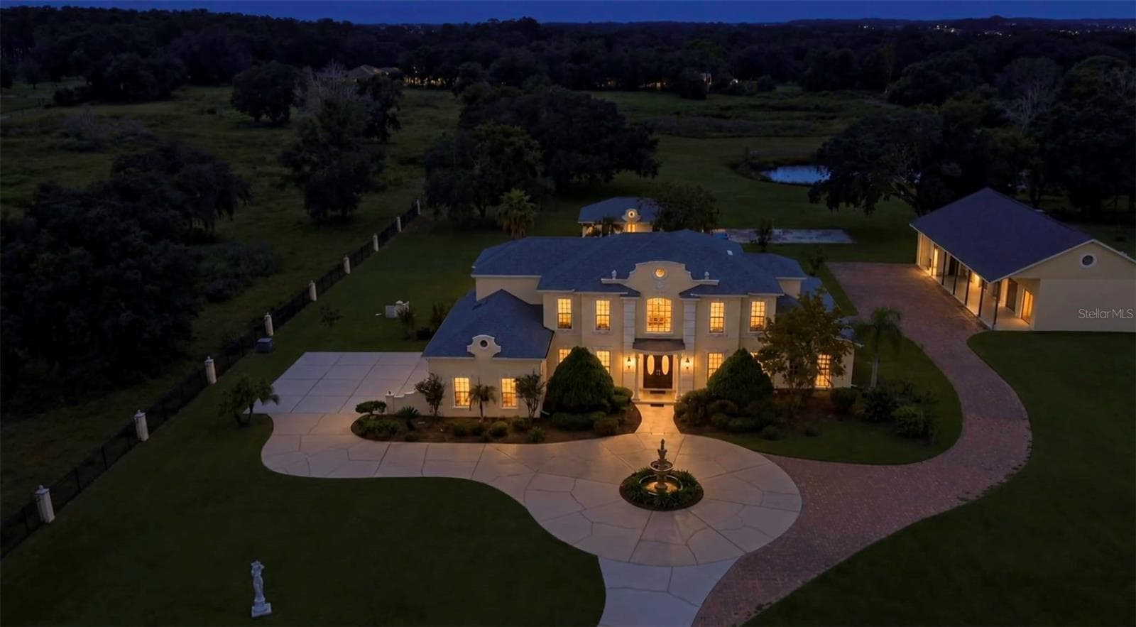 Tyndall at night - 32632 TYNDALL RD, WESLEY CHAPEL