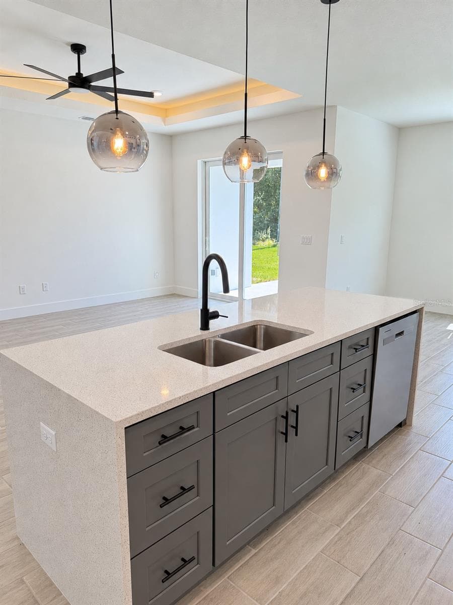 Island and storage detail. Actual property photo, digitally refined. - 24479 SW KINGSWAY CIR, ARCADIA