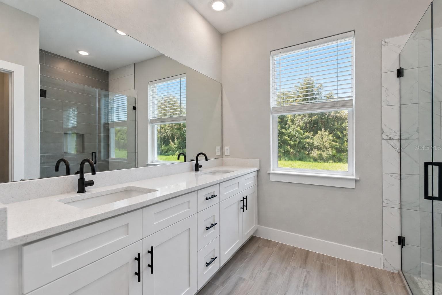 Primary bathroom. Digitally edited model/property composite. - 24479 SW KINGSWAY CIR, ARCADIA