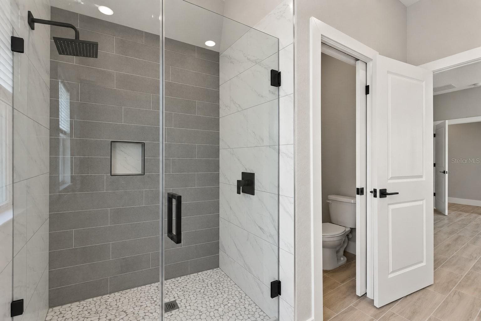 Primary shower. Digitally edited model/property composite. - 24479 SW KINGSWAY CIR, ARCADIA