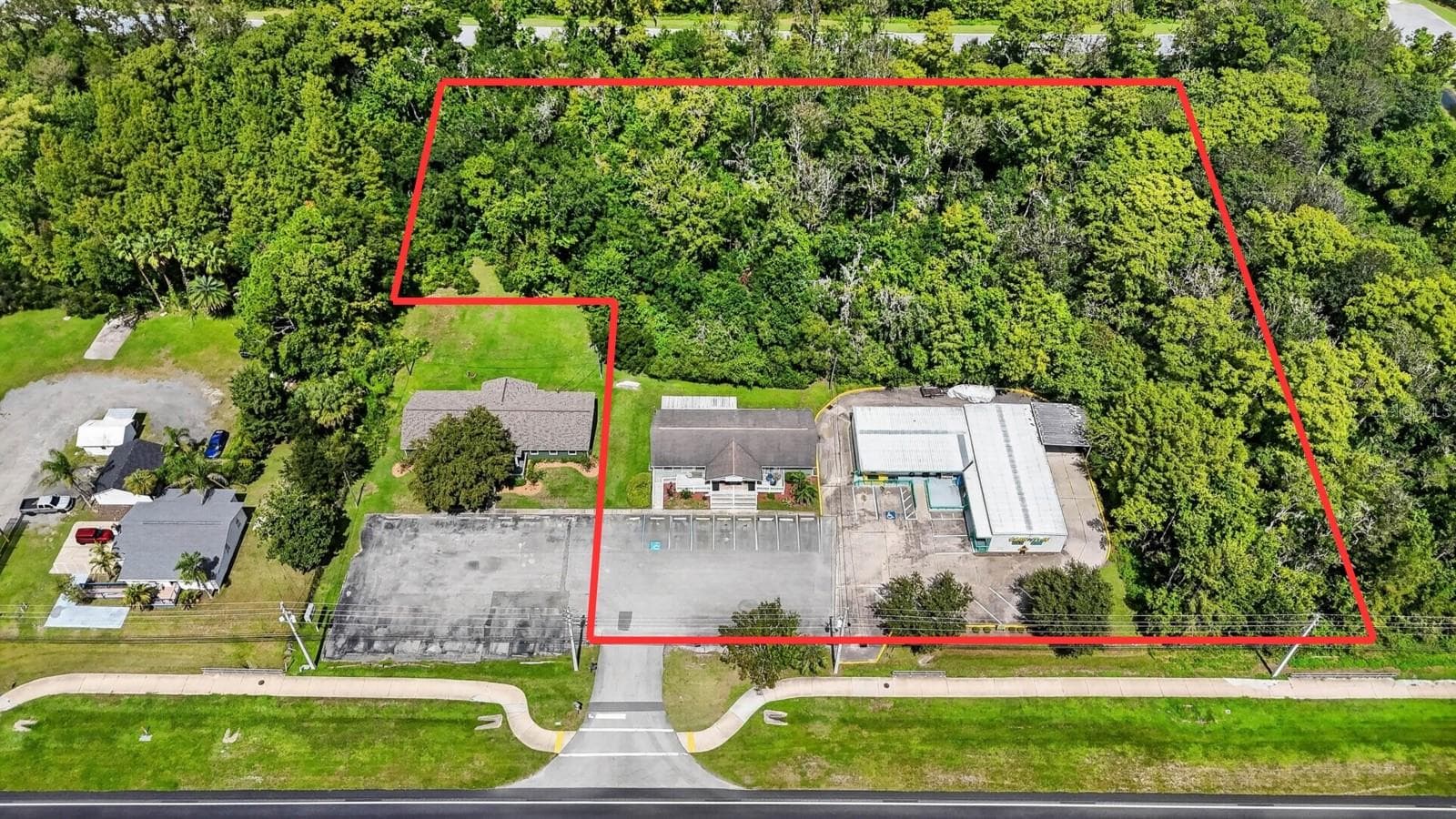 3300 East Moody Blvd is the building to the right. 3250 E Moody Blvd (Also listed for sale) is the building within the red border to the right. Land is shared - 3300 E MOODY BLVD, BUNNELL