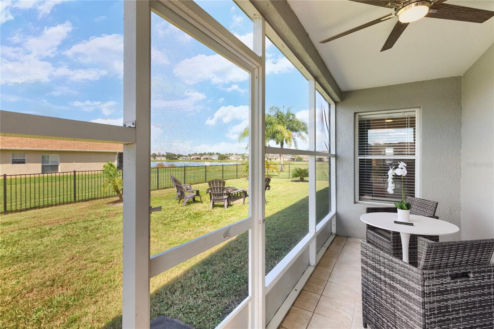 Enjoy Tea or coffee on the screened patio - 7619 CRESCENT PALM DR, WESLEY CHAPEL