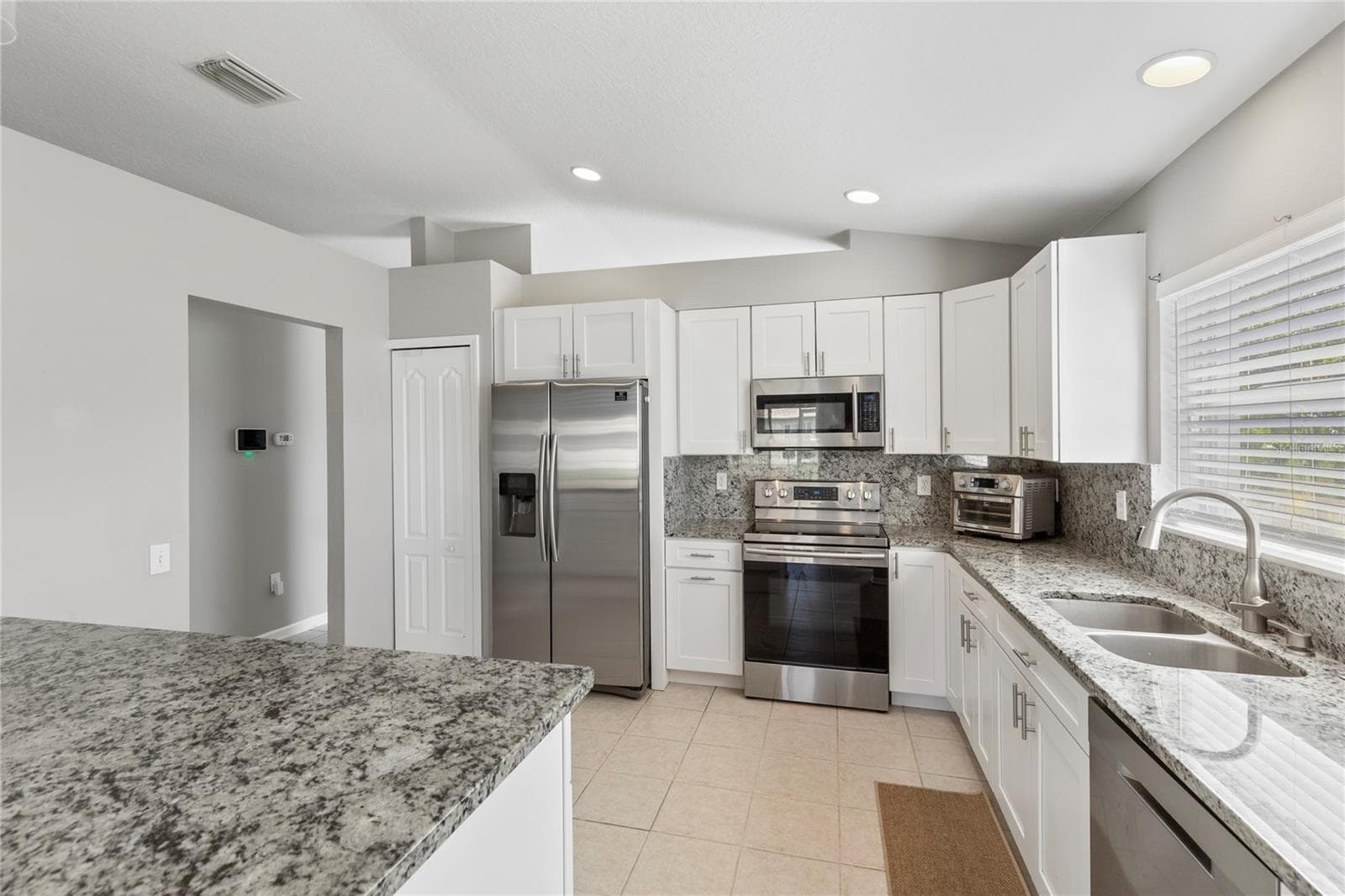 Stainless steel appliances suite - 7619 CRESCENT PALM DR, WESLEY CHAPEL