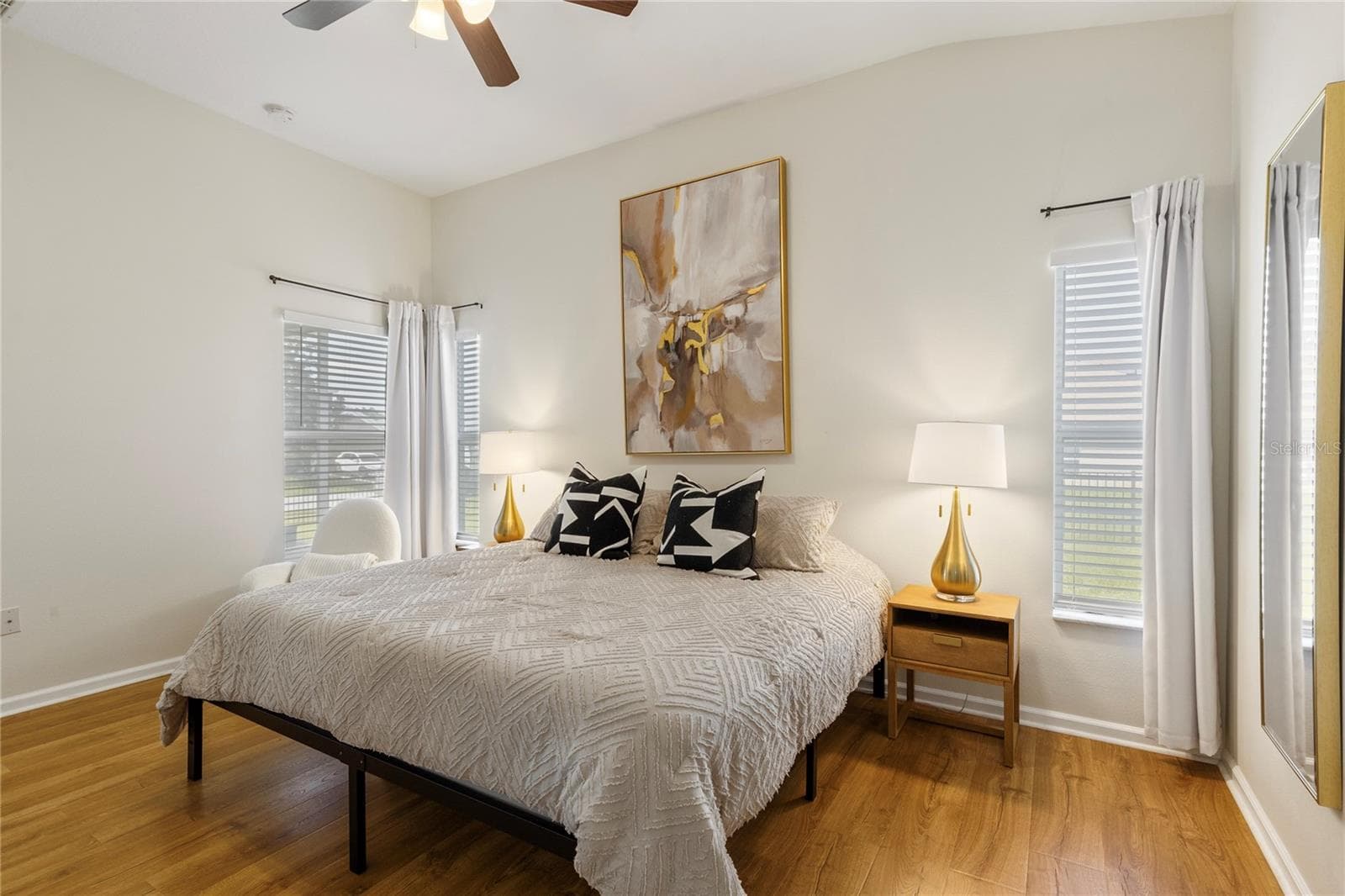 Primary room fits King bed, nightstands, dresser, chair, and more! - 7619 CRESCENT PALM DR, WESLEY CHAPEL