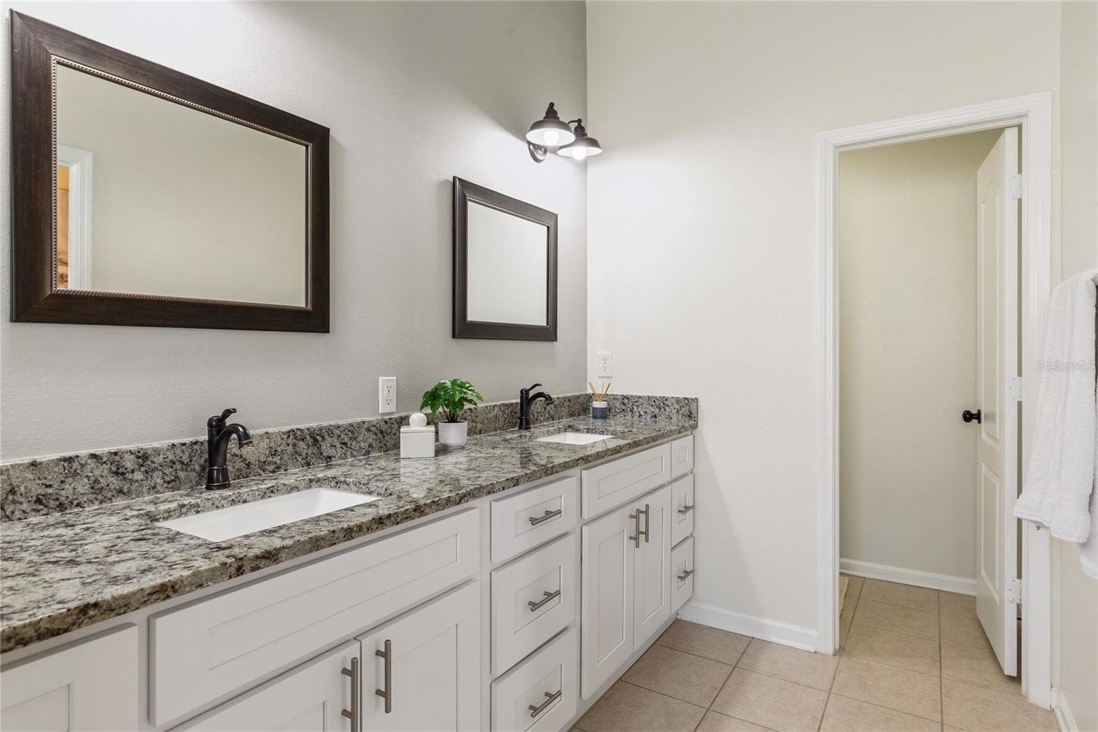 Double sink vanity with drawers and storage galore - 7619 CRESCENT PALM DR, WESLEY CHAPEL