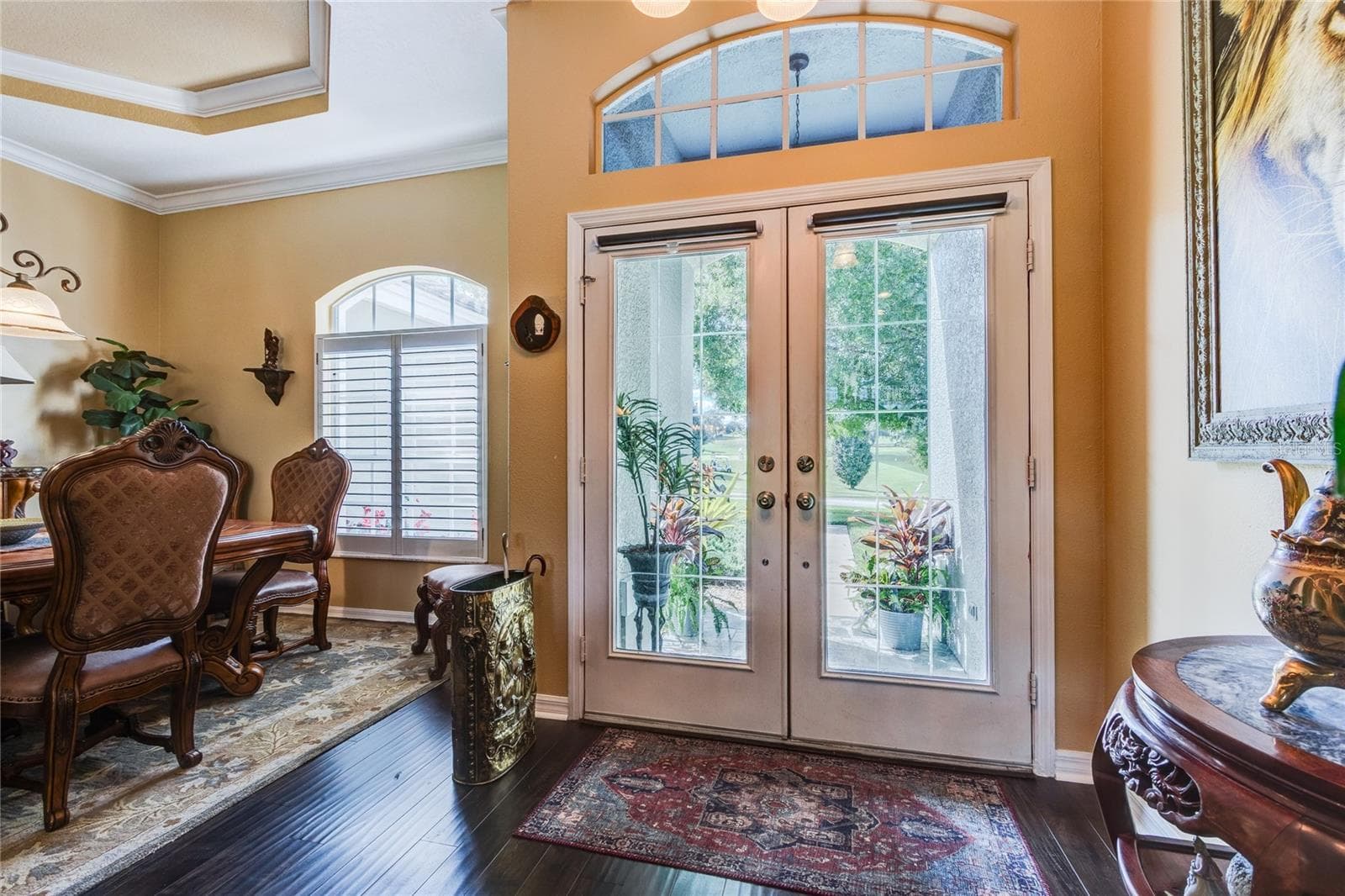 Double glass doors open to a serene golf course view at front too! - 13030 GRAND TRAVERSE DR, DADE CITY