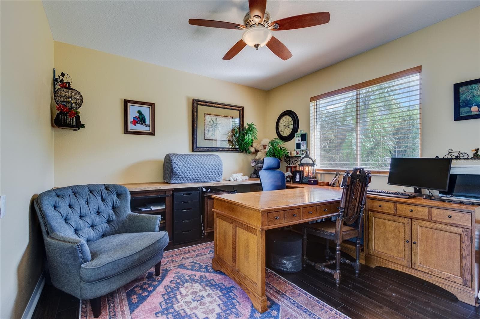 Back bedroom (set up as home office) with double window and sliders to pool area - 13030 GRAND TRAVERSE DR, DADE CITY