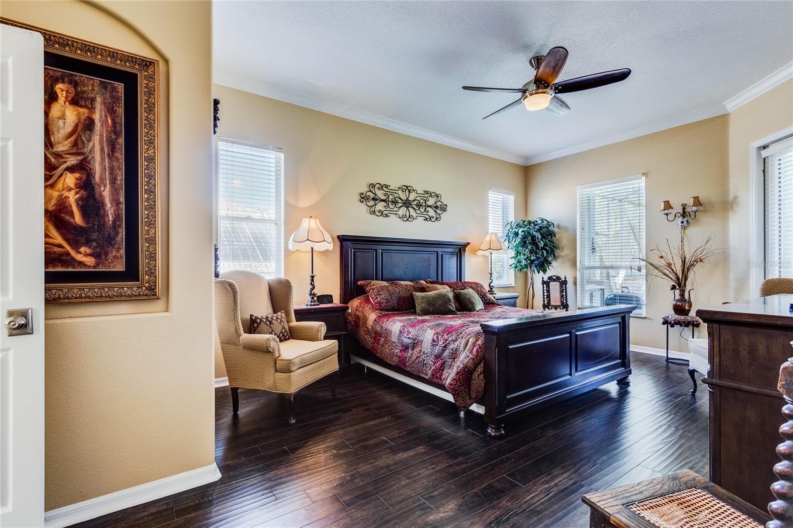 Owners retreat with slider to pool area - 13030 GRAND TRAVERSE DR, DADE CITY