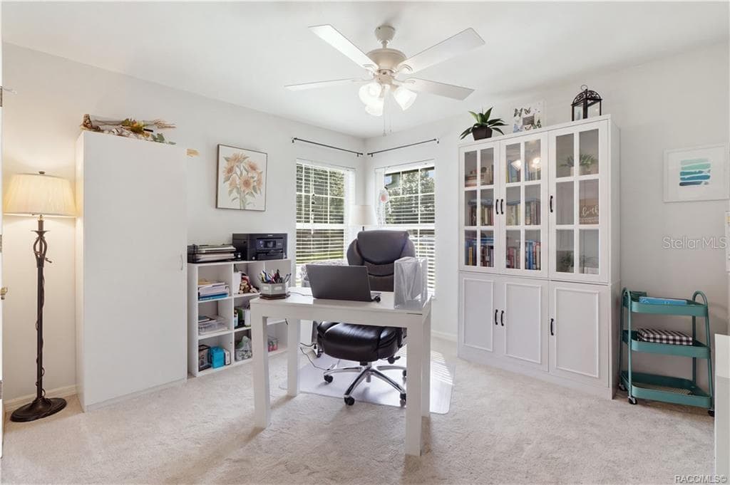 Versatile Bedroom or Home Office – Light-filled room featuring two windows, ceiling fan & comfortable space for a home office, guest bedroom or hobby room. - 1436 N CHERRY POP DR, HERNANDO