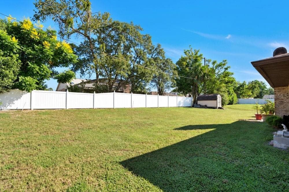 Backyard with Tool Shed - 902 VICKSBURG STREET ST, DELTONA