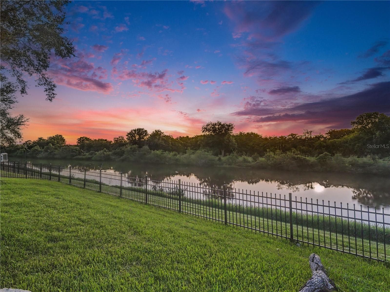 Fenced Backyard with lake views - 7124 34TH ST E, SARASOTA
