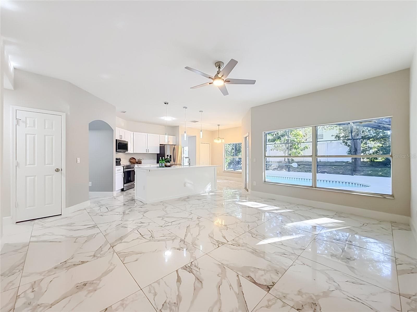 Family and kitchen area - 4574 AGUILA PL, ORLANDO