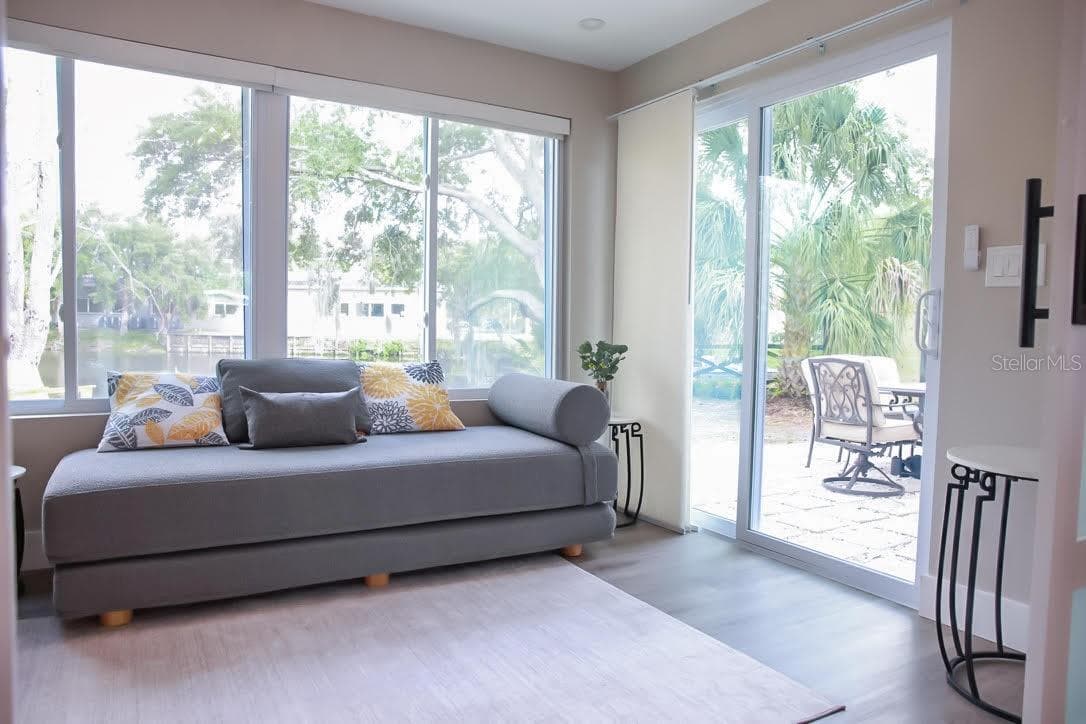 Bedroom #2 w/sliders to back yard oasis - 405 MANOR BLVD, PALM HARBOR