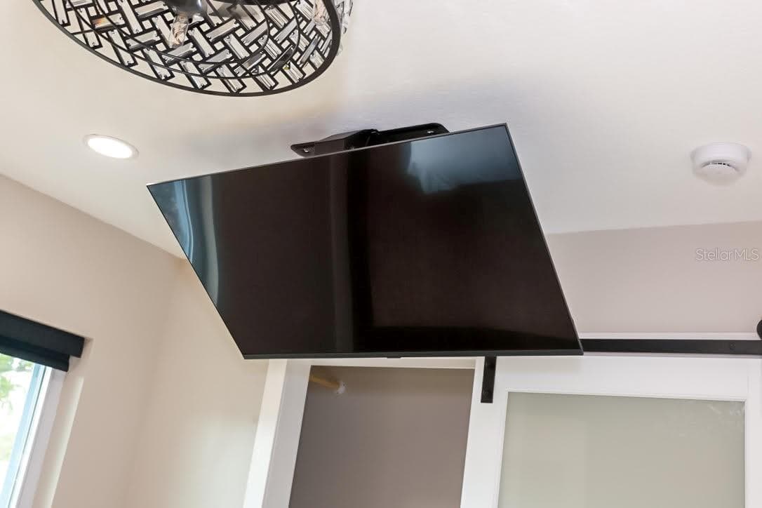 Remote controlled TV mounting system - 405 MANOR BLVD, PALM HARBOR