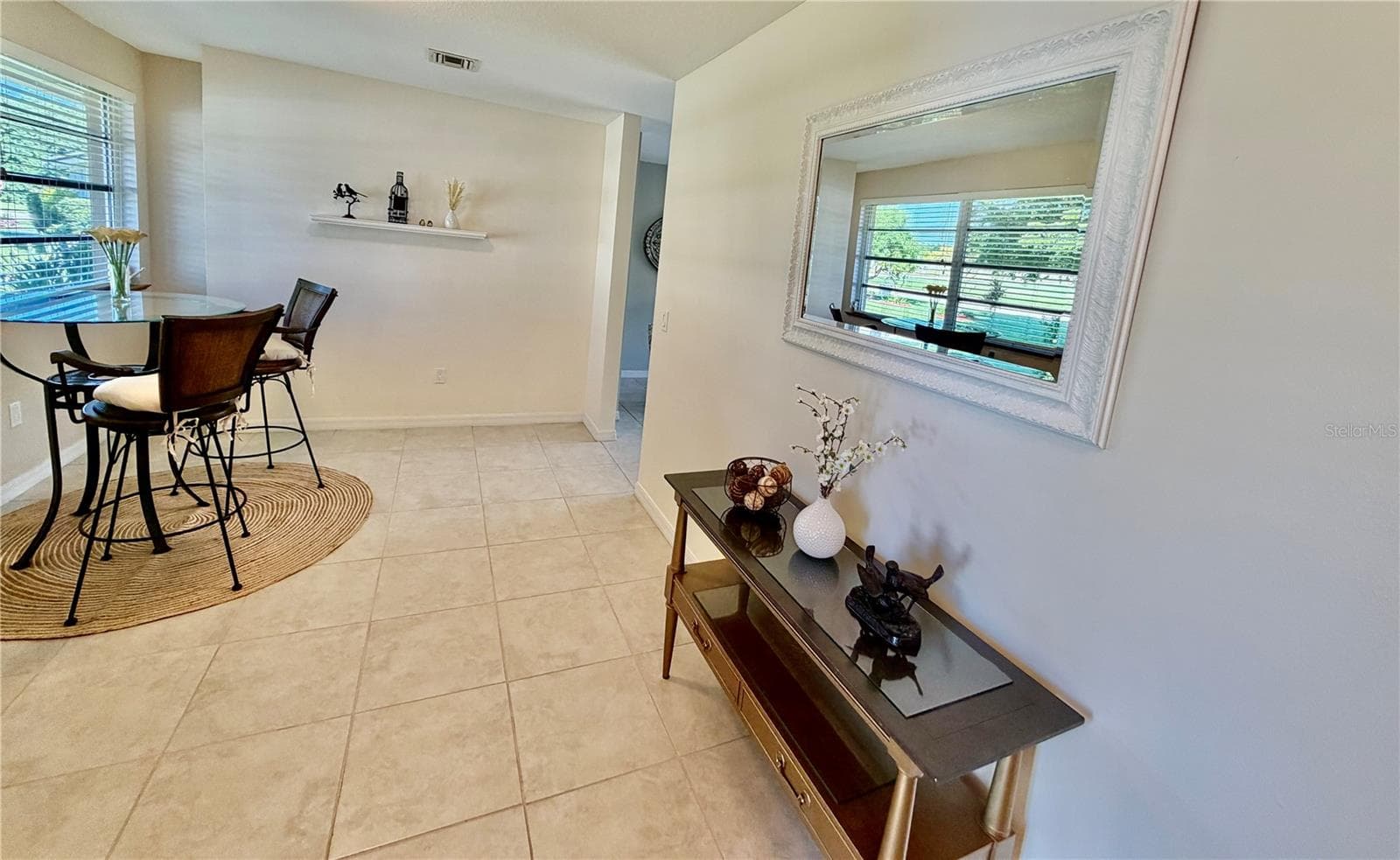 Front entry with versatile space for dining, crafts, etc! - 1311 TUSCANY DR, PUNTA GORDA