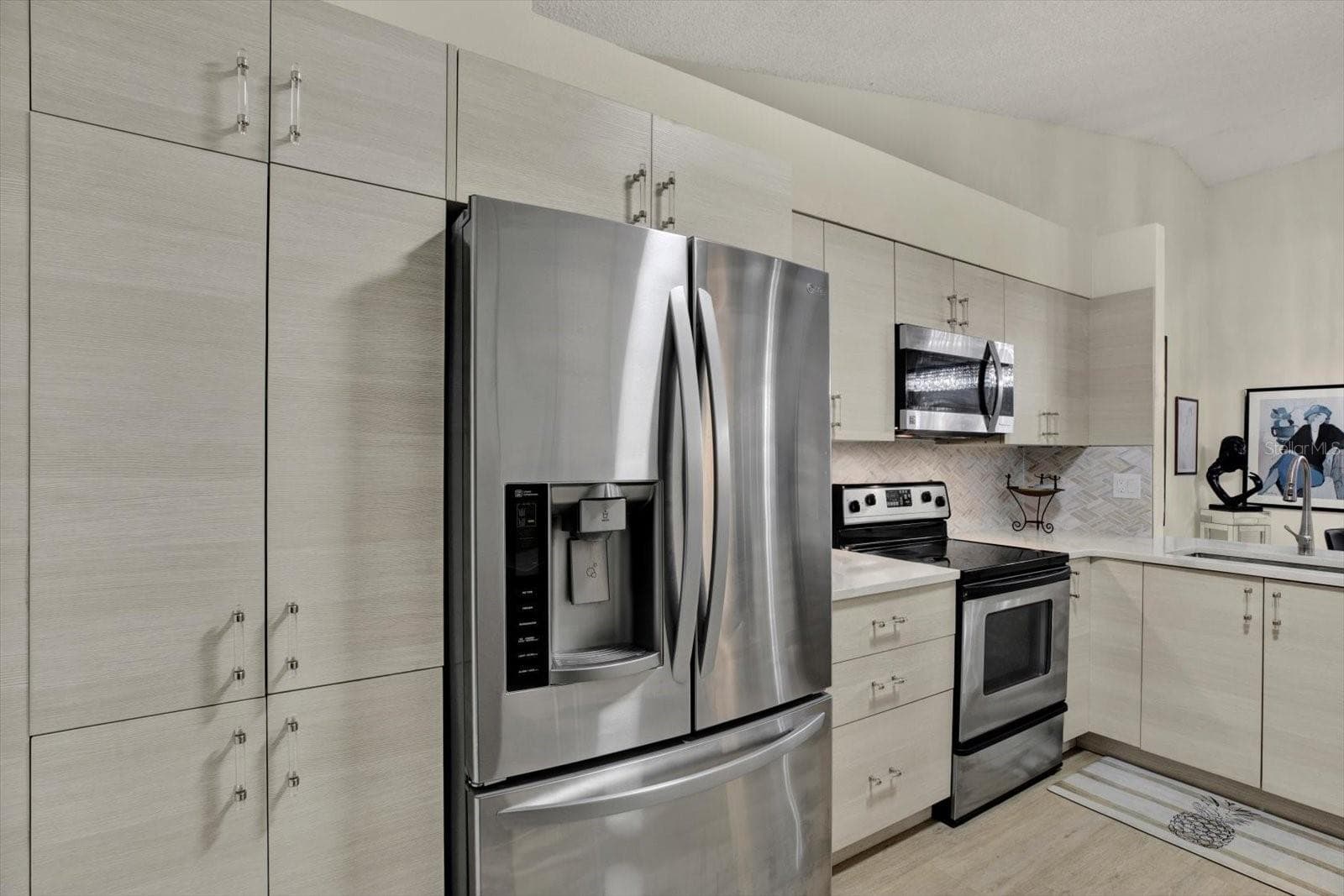 Galley kitchen layout - 3433 HILLMOOR DR, PALM HARBOR