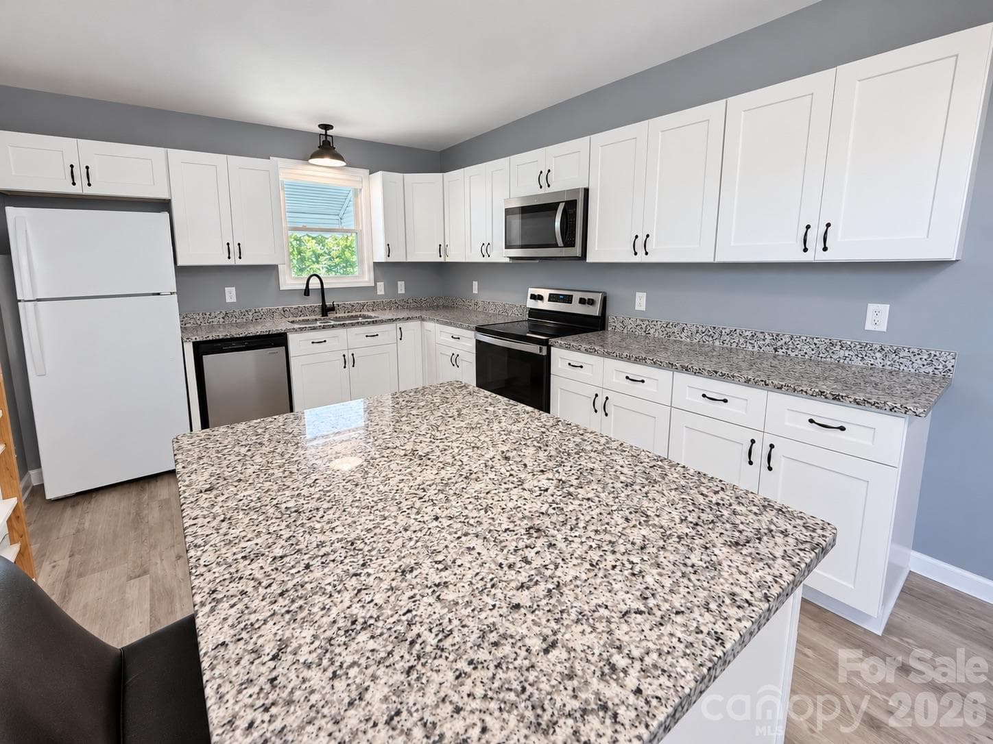 Kitchen - picture has been virtually edited for lighting and staging purposes - 745 6th Avenue SW, Hickory
