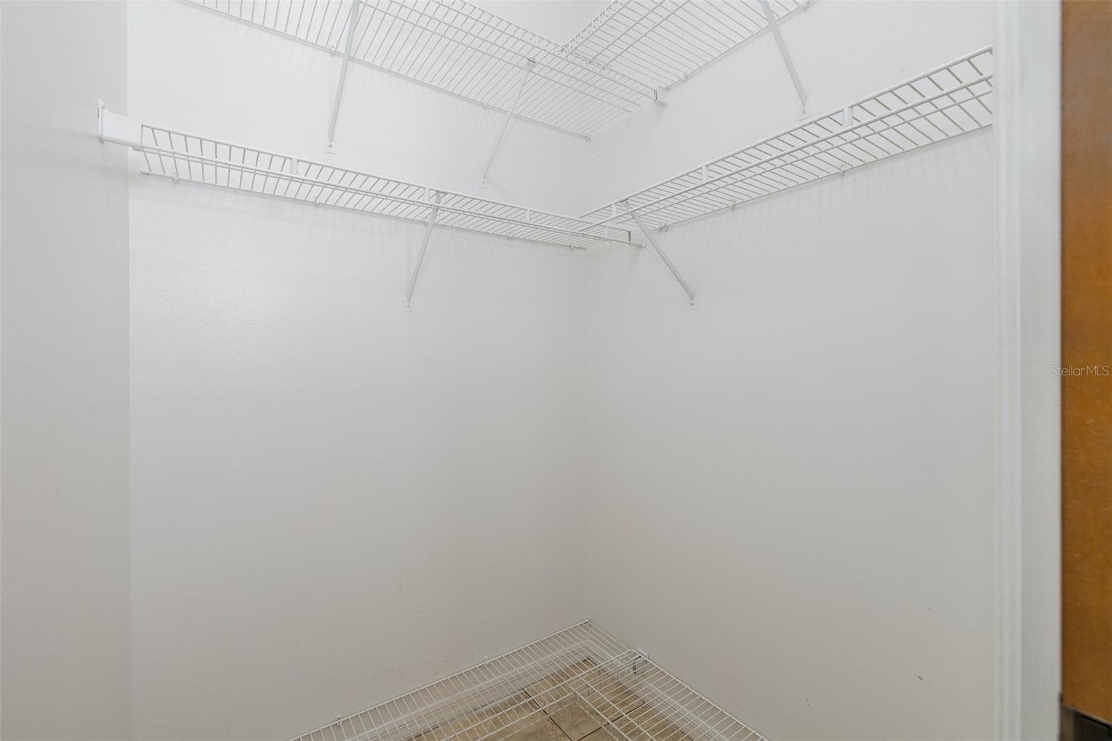 Primary suite walk in closet - 8231 MATTHEW DR, NEW PORT RICHEY