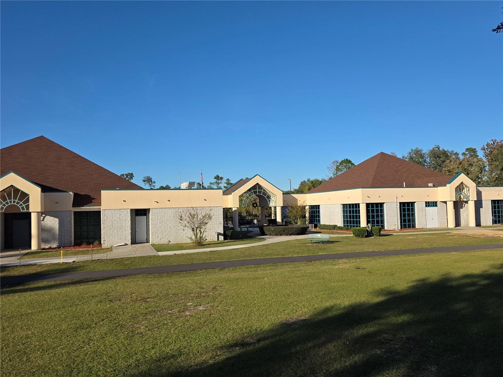 The back side of the community center - 3418 SW 155TH PL, OCALA