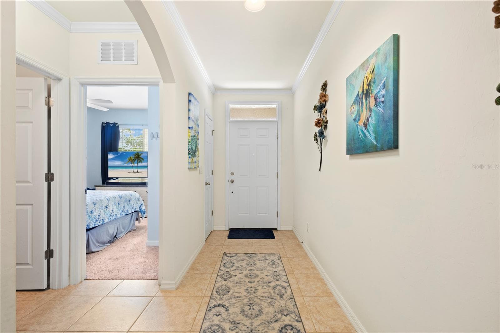 Nice entryway with Crown Molding and Baseboards. - 9259 CALUMET BLVD, PORT CHARLOTTE