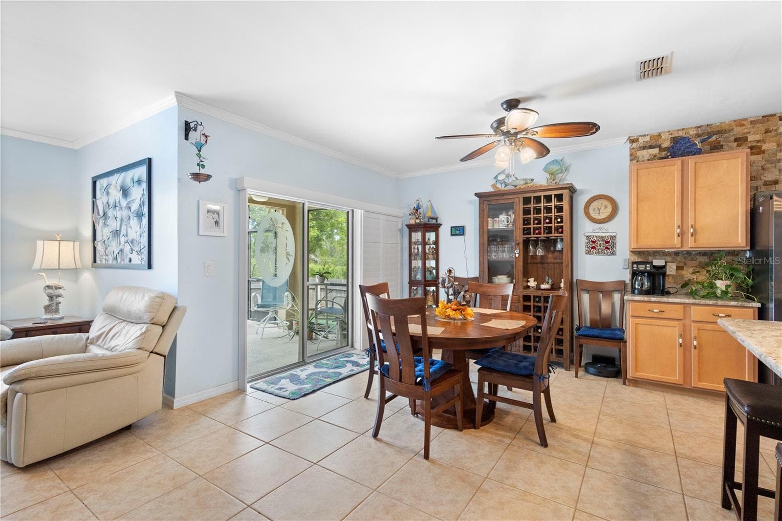Sliding glass doors open to the pool and Lanai. - 9259 CALUMET BLVD, PORT CHARLOTTE