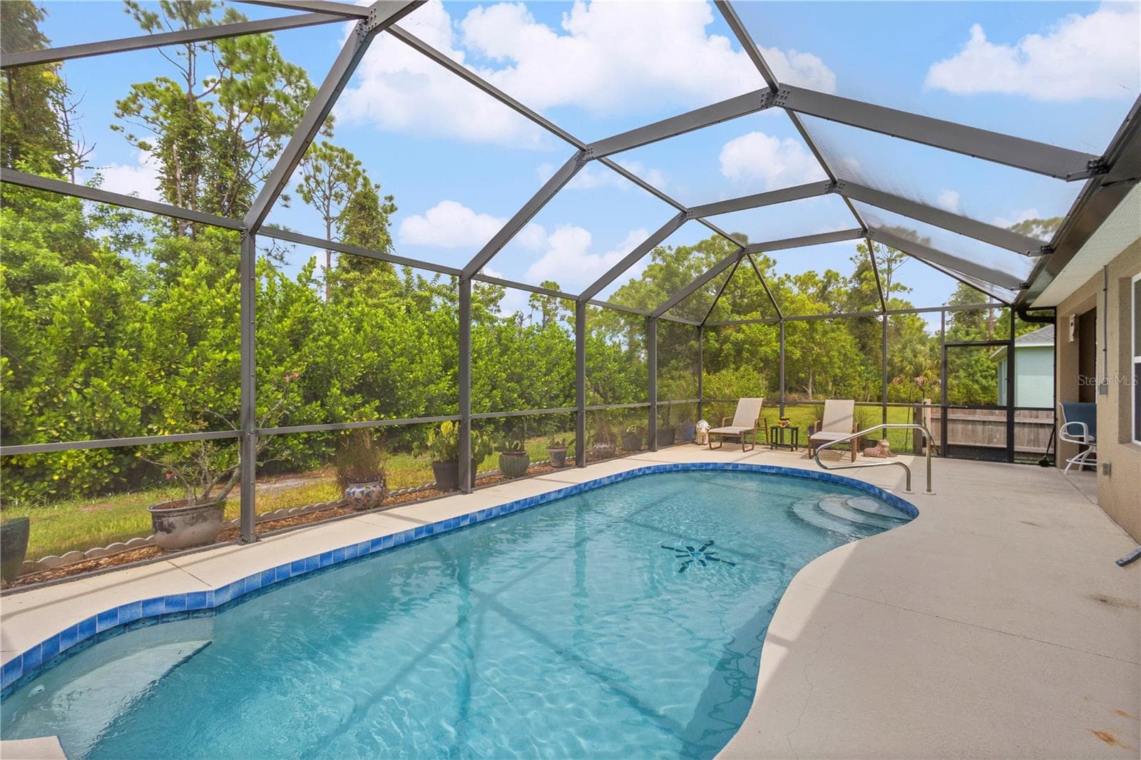 Sparkling heated pool to enjoy with privacy. - 9259 CALUMET BLVD, PORT CHARLOTTE