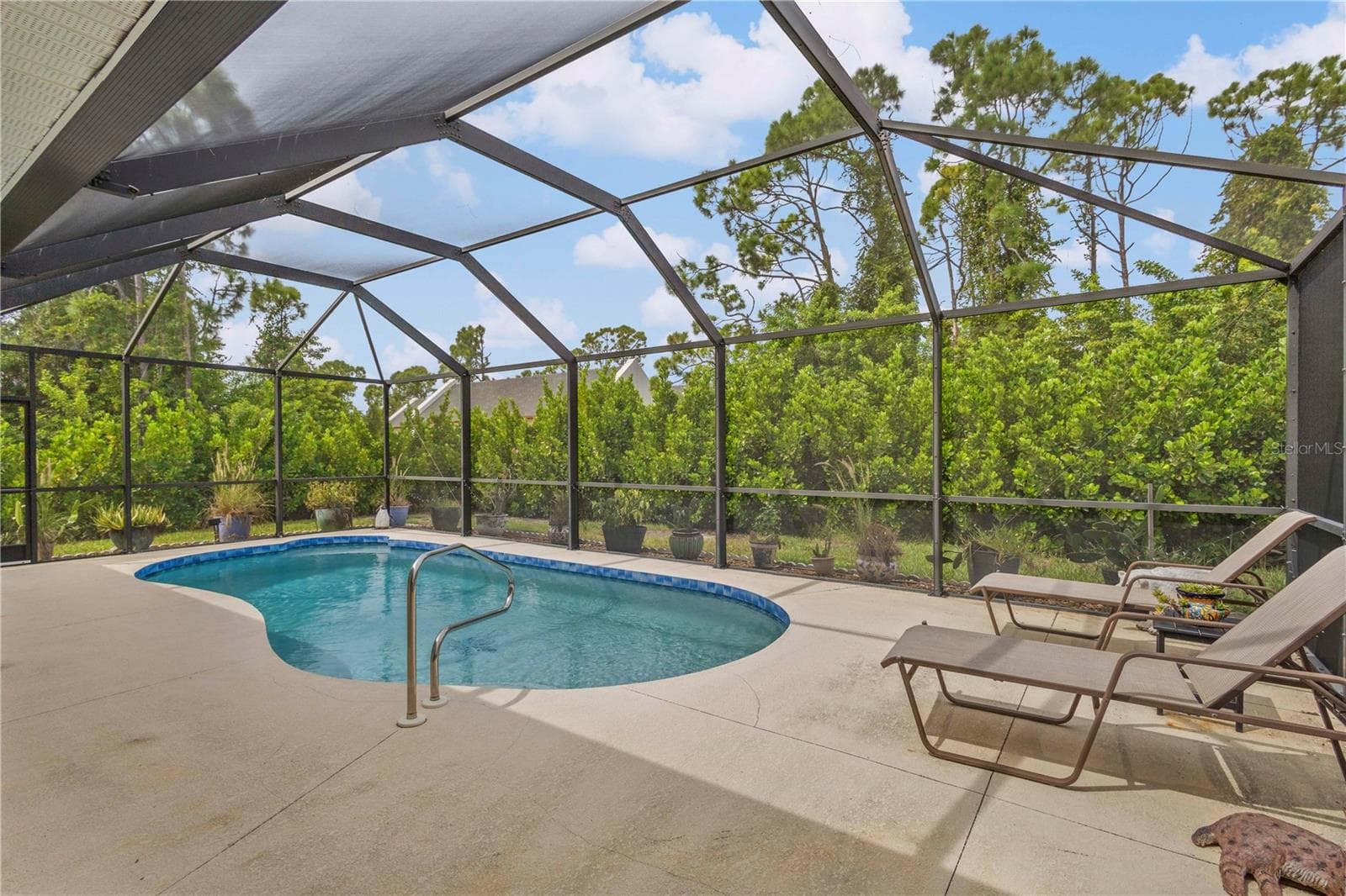 Extended lanai to relax by the pool, read a book or entertain. - 9259 CALUMET BLVD, PORT CHARLOTTE