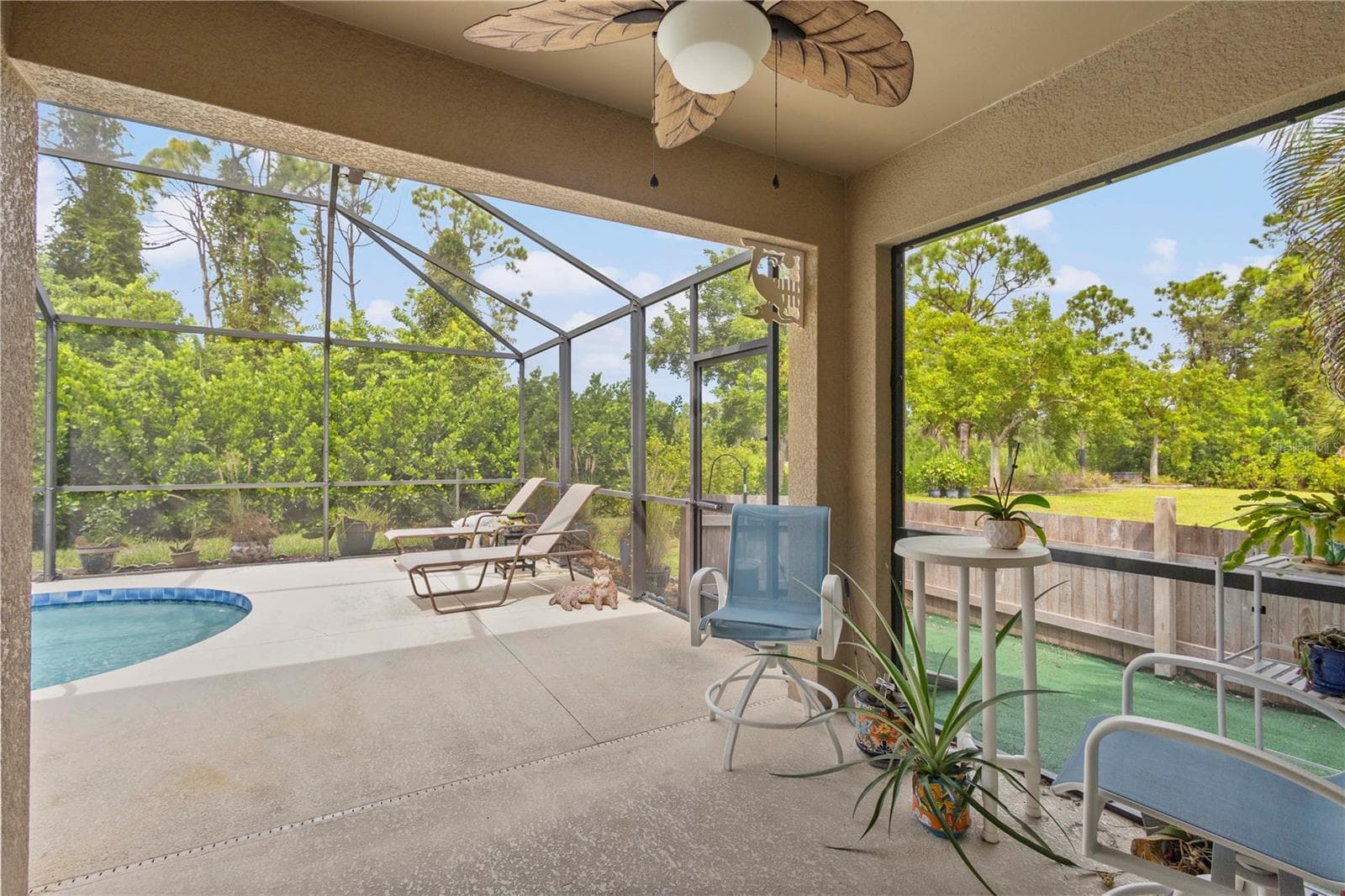 Fenced area off of Lanai for your pets. - 9259 CALUMET BLVD, PORT CHARLOTTE
