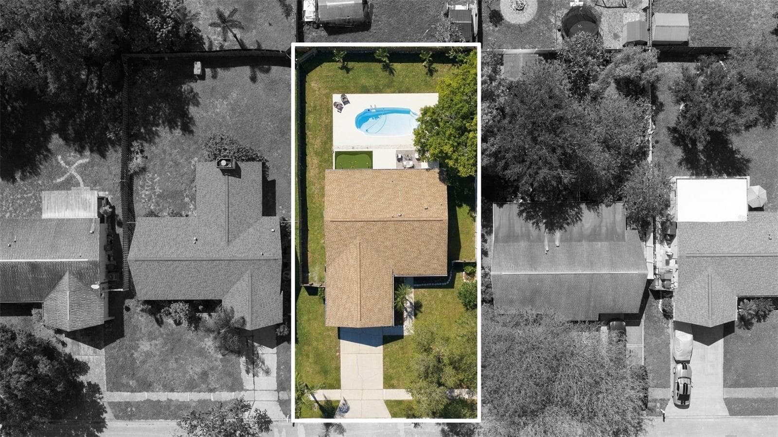Aerial showing large fenced yard - 1613 GREENWOOD DR, DUNEDIN