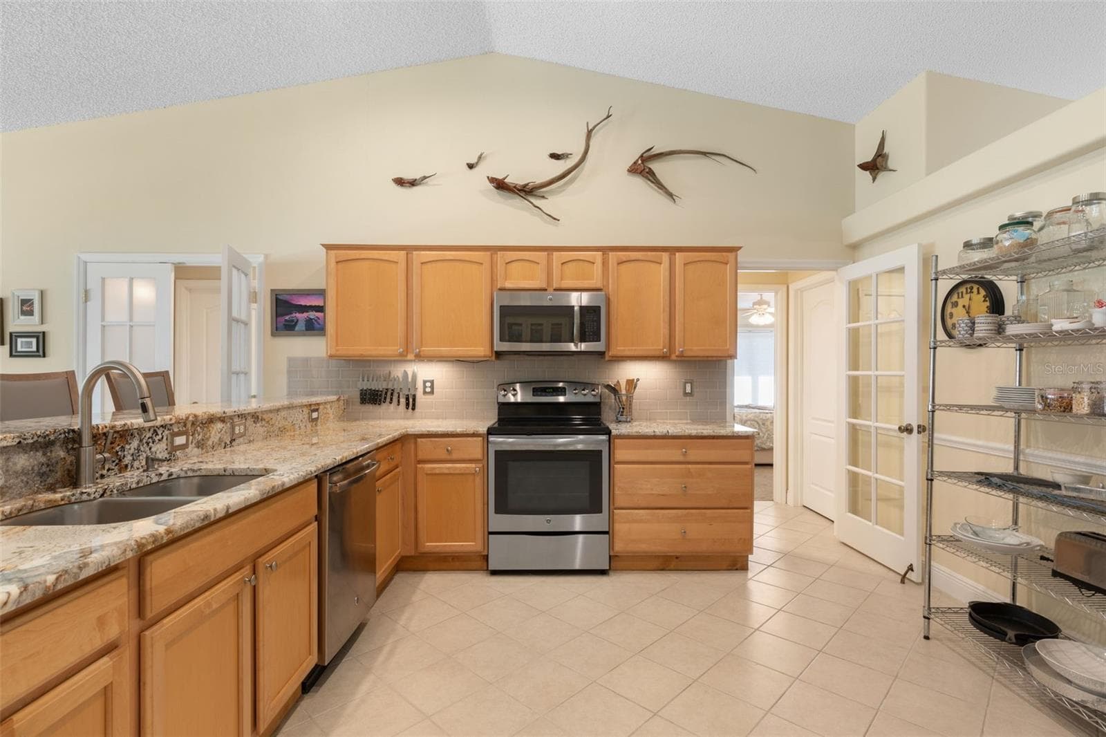 Everything has its place in this thoughtfully arranged kitchen, where ample storage keeps essentials close at hand and a practical layout makes everything from weeknight dinners to elaborate recipes a pleasure. - 19 EDGELY LN, PALM COAST