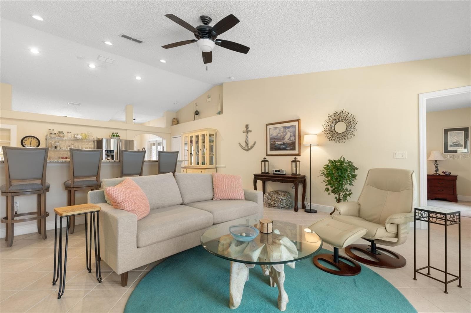 There's something special about a home that gives everyone room to spread out while still feeling connected. The expansive, open design and vaulted ceilings create an airy atmosphere where everyday living feels wonderfully unrestricted. - 19 EDGELY LN, PALM COAST