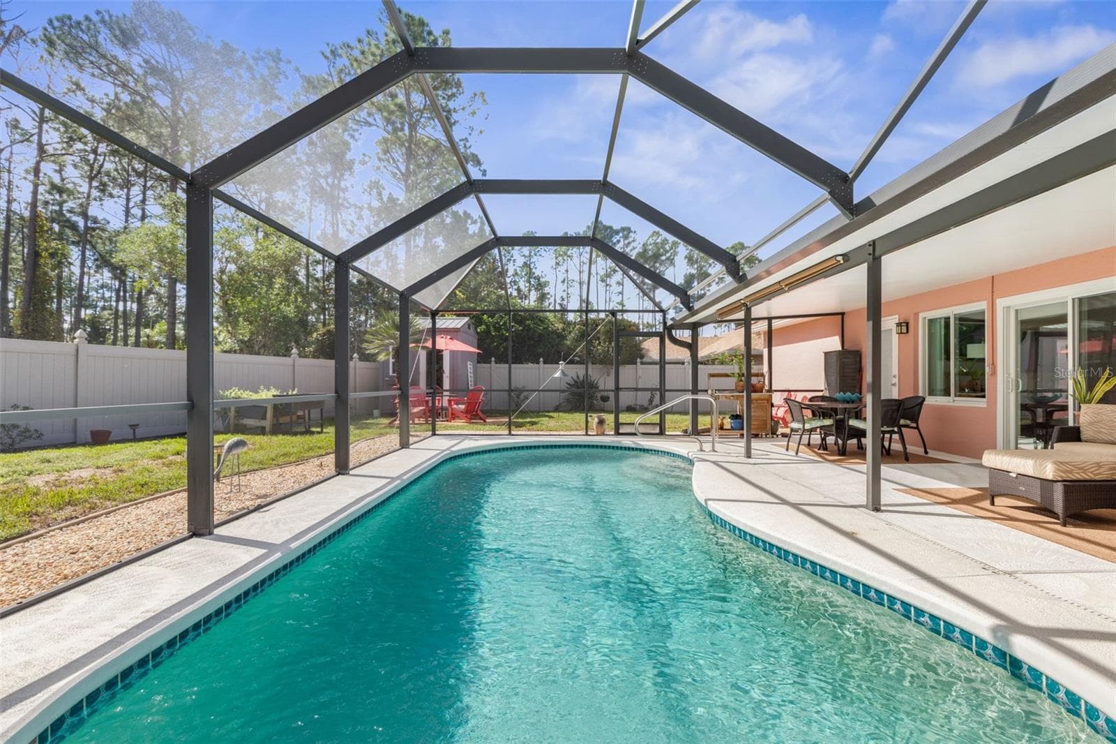 Forget the crowded beaches and packed resorts! Enjoy the freedom of your own screened pool, where spontaneous swims and leisurely afternoons are always on the agenda. - 19 EDGELY LN, PALM COAST