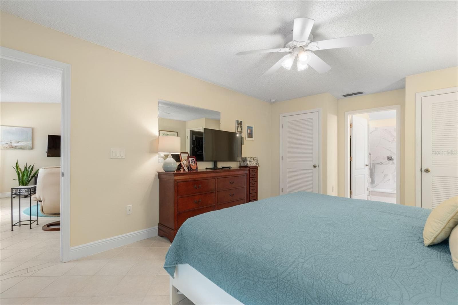 Your own private retreat awaits! The primary suite offers generous space to unwind, with a thoughtfully arranged layout, ample closet storage, and the convenience of an adjoining bath. - 19 EDGELY LN, PALM COAST
