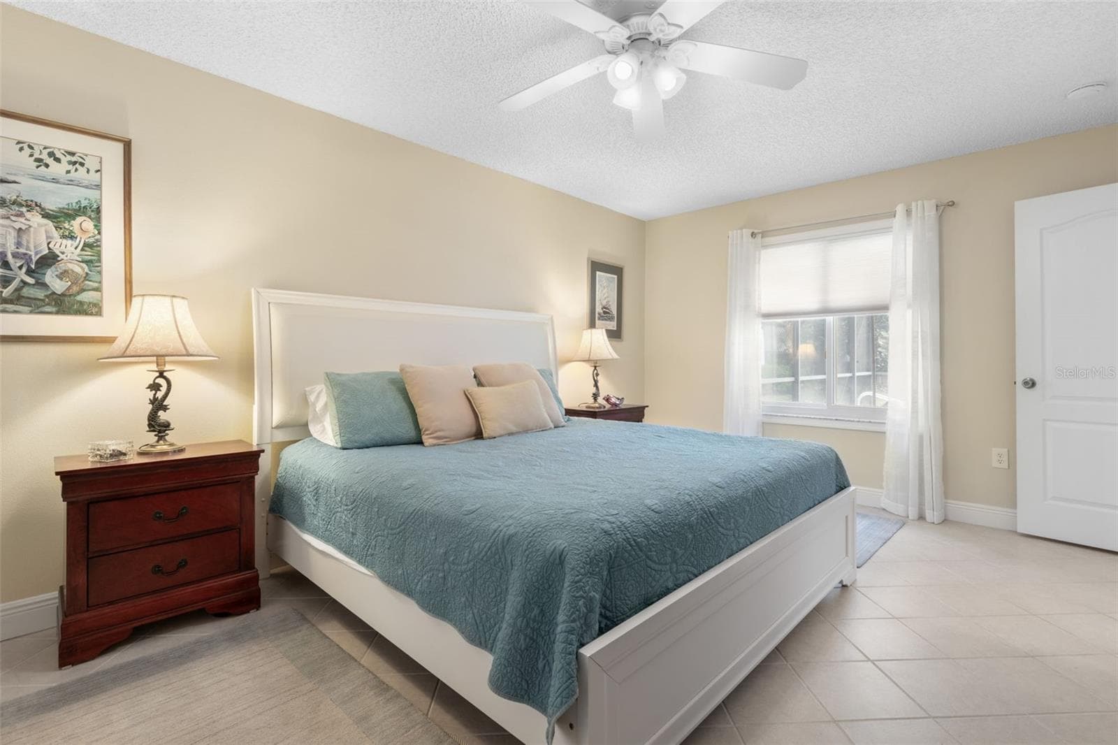 Imagine waking up to the Florida sunshine with a glimpse of your sparkling pool just beyond the window. This primary bedroom brings a little vacation feeling to every morning! - 19 EDGELY LN, PALM COAST