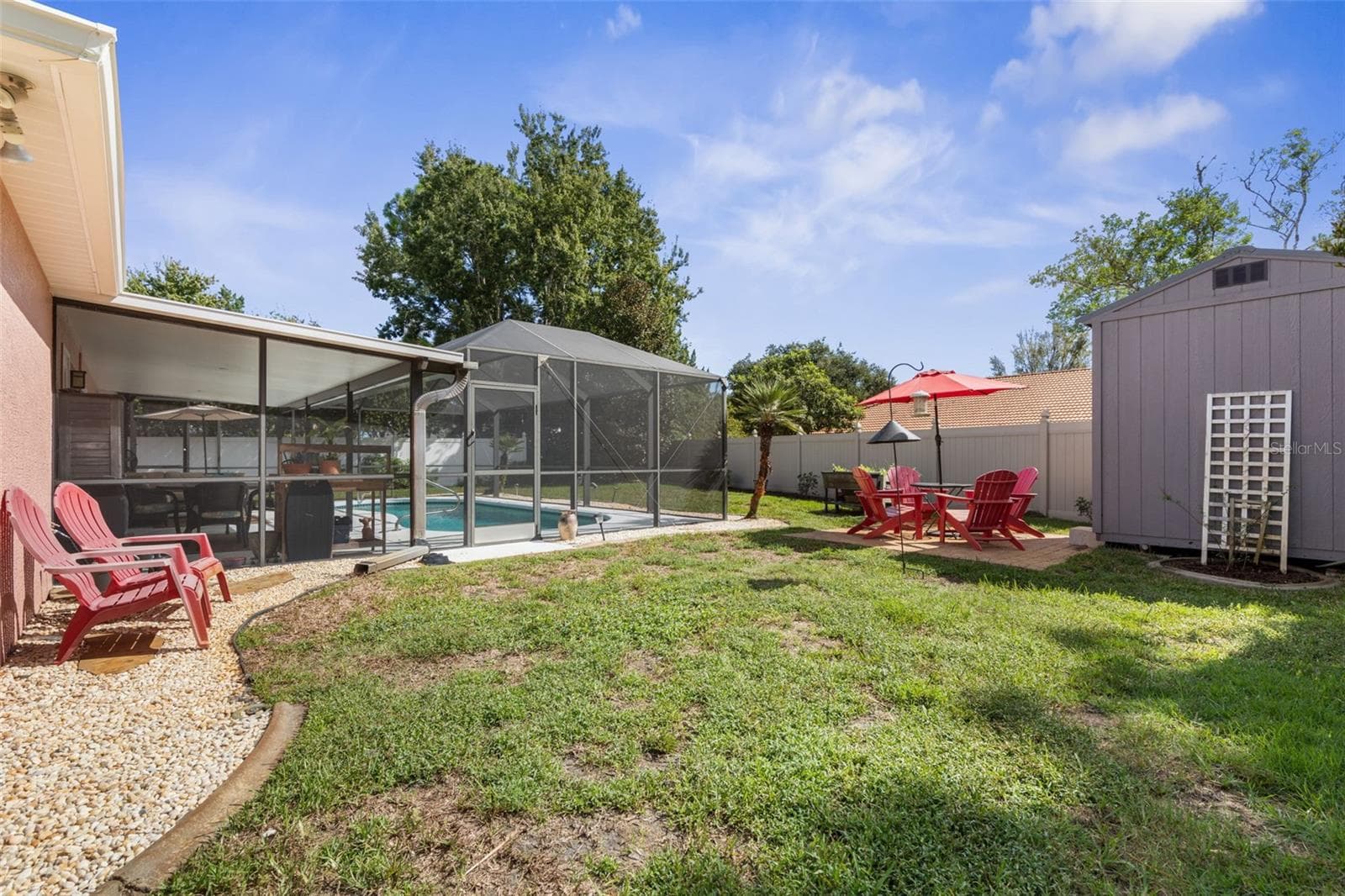 From poolside splashes to backyard barbecues and evenings under the stars, this fenced backyard offers plenty of ways to enjoy the Florida sunshine. With room to play, entertain, or simply unwind, every day can feel like a getaway - 19 EDGELY LN, PALM COAST